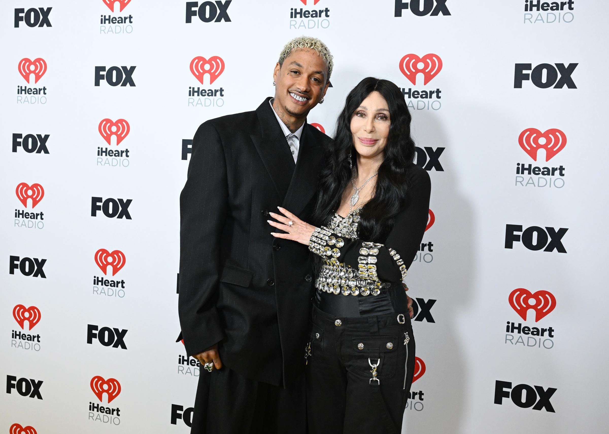 Cher and Alexander "AE" Edwards at the iHeartRadio Music Awards in Los Angeles, California on April 1, 2024. | Source: Getty Images