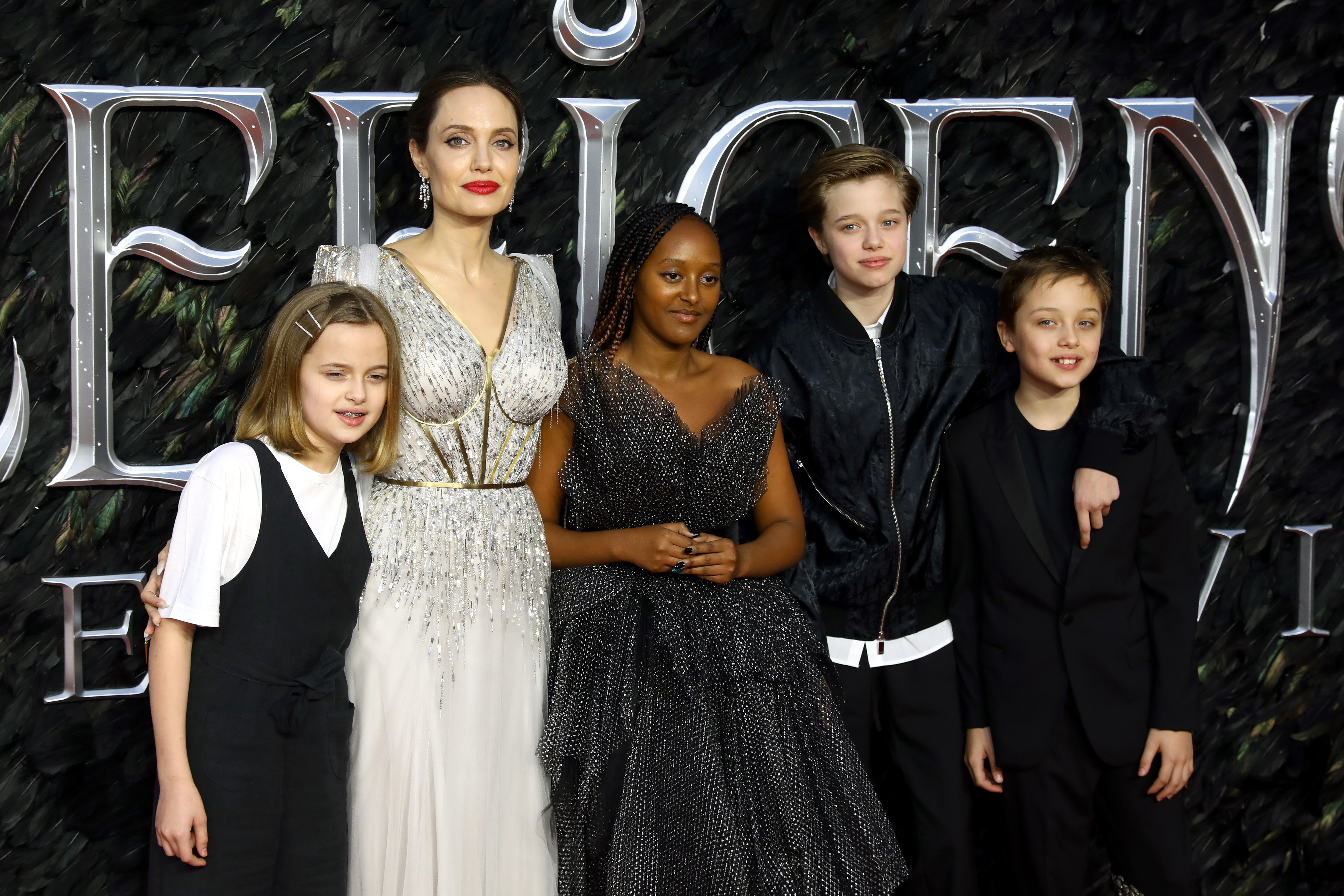Vivienne Marcheline Jolie-Pitt, Angelina Jolie, Zahara Marley Jolie-Pitt, Shiloh Nouvel Jolie-Pitt and Knox Jolie-Pitt attend the European premiere of "Maleficent: Mistress of Evil" at Odeon IMAX Waterloo on October 09, 2019 in London, England. | Source: Getty Images