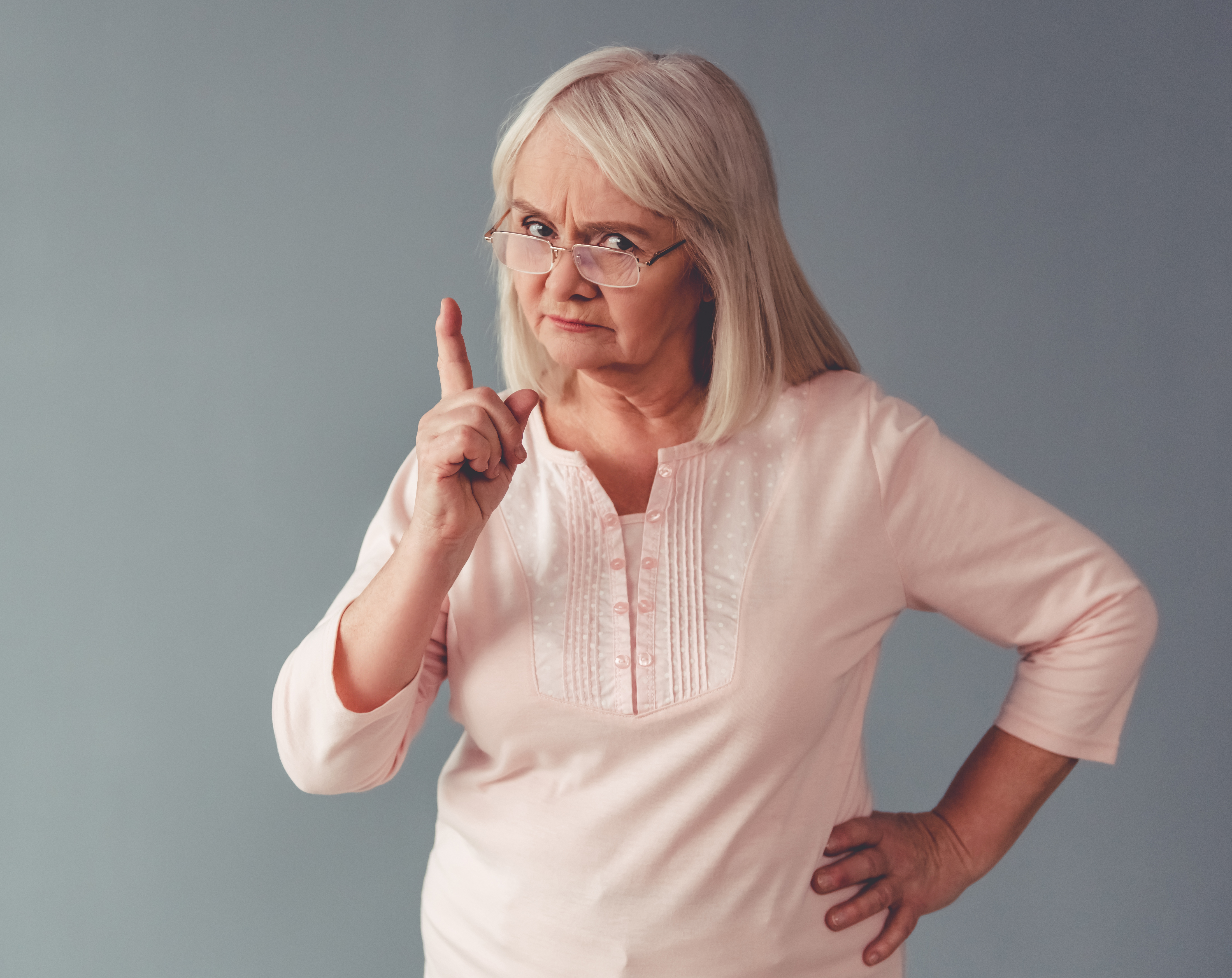 Angry older woman pointing a finger | Source: Shutterstock