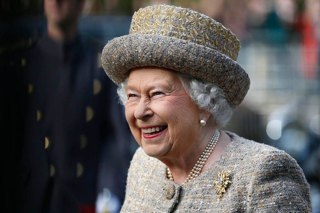 Queen Elizabeth II smiles as she arrives before the Opening of the Flanders' Fields Memorial Garden at Wellington Barracks on November 6, 2014 | Photo: Getty Images