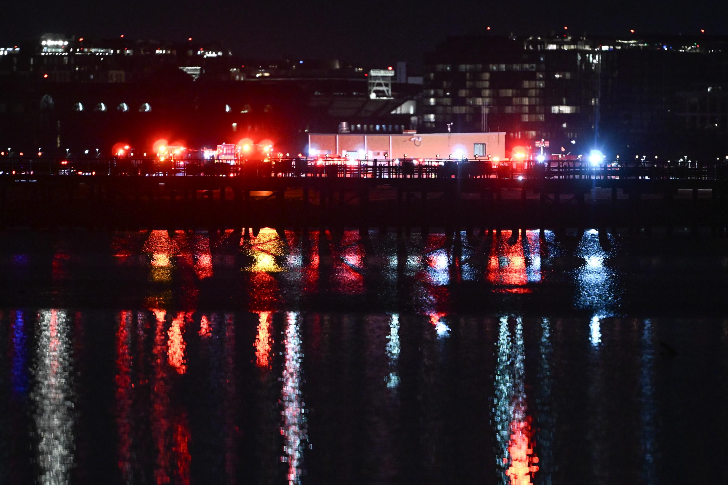 A view of the scene after a regional plane collided in midair with a military helicopter and crashed into the Potomac River in Washington, D.C. on January 30, 2025. | Source: Getty Images