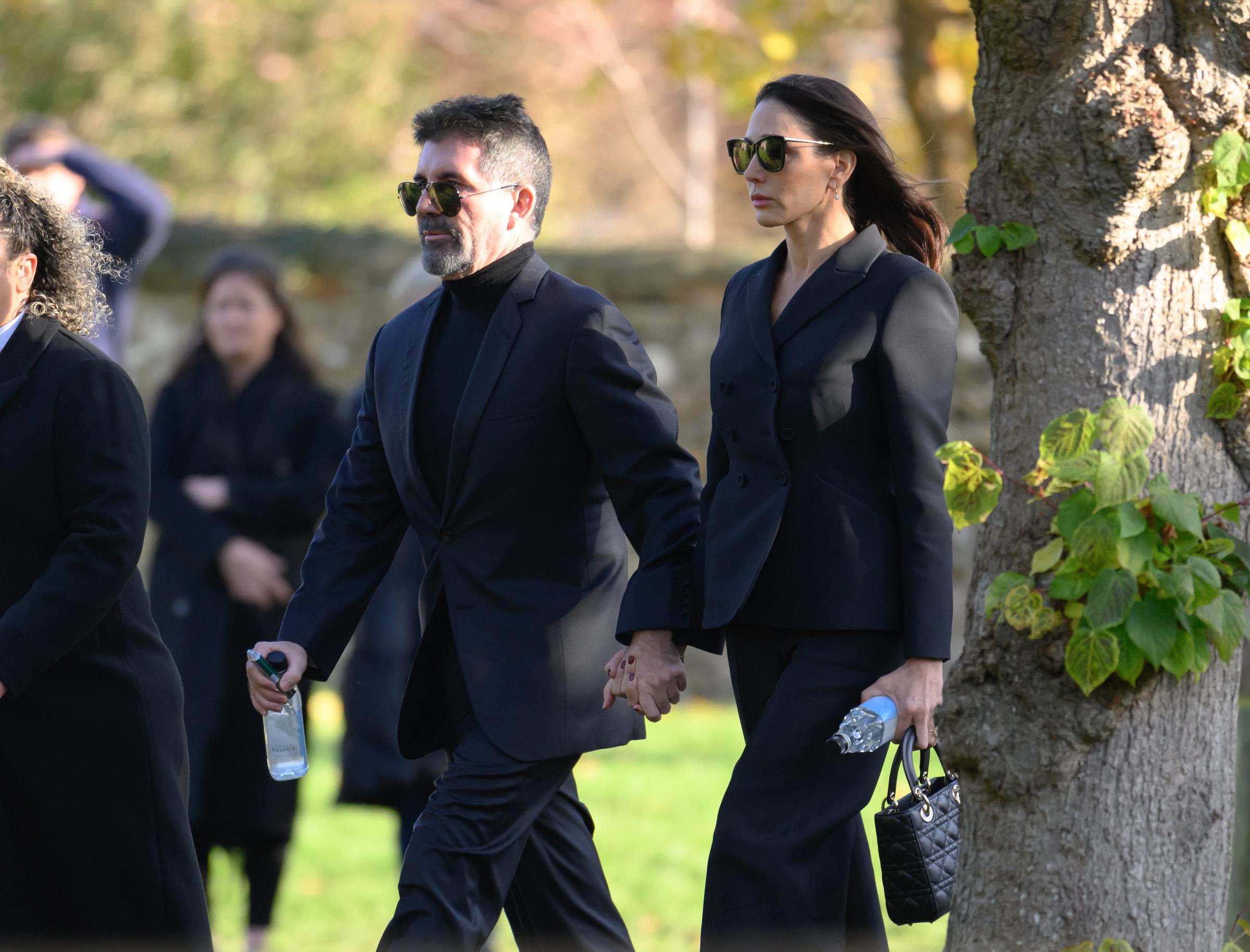 Simon Cowell and Lauren Silverman at Liam Payne's funeral at St. Mary's Church in Amersham on November 20, 2024 | Source: Getty Images