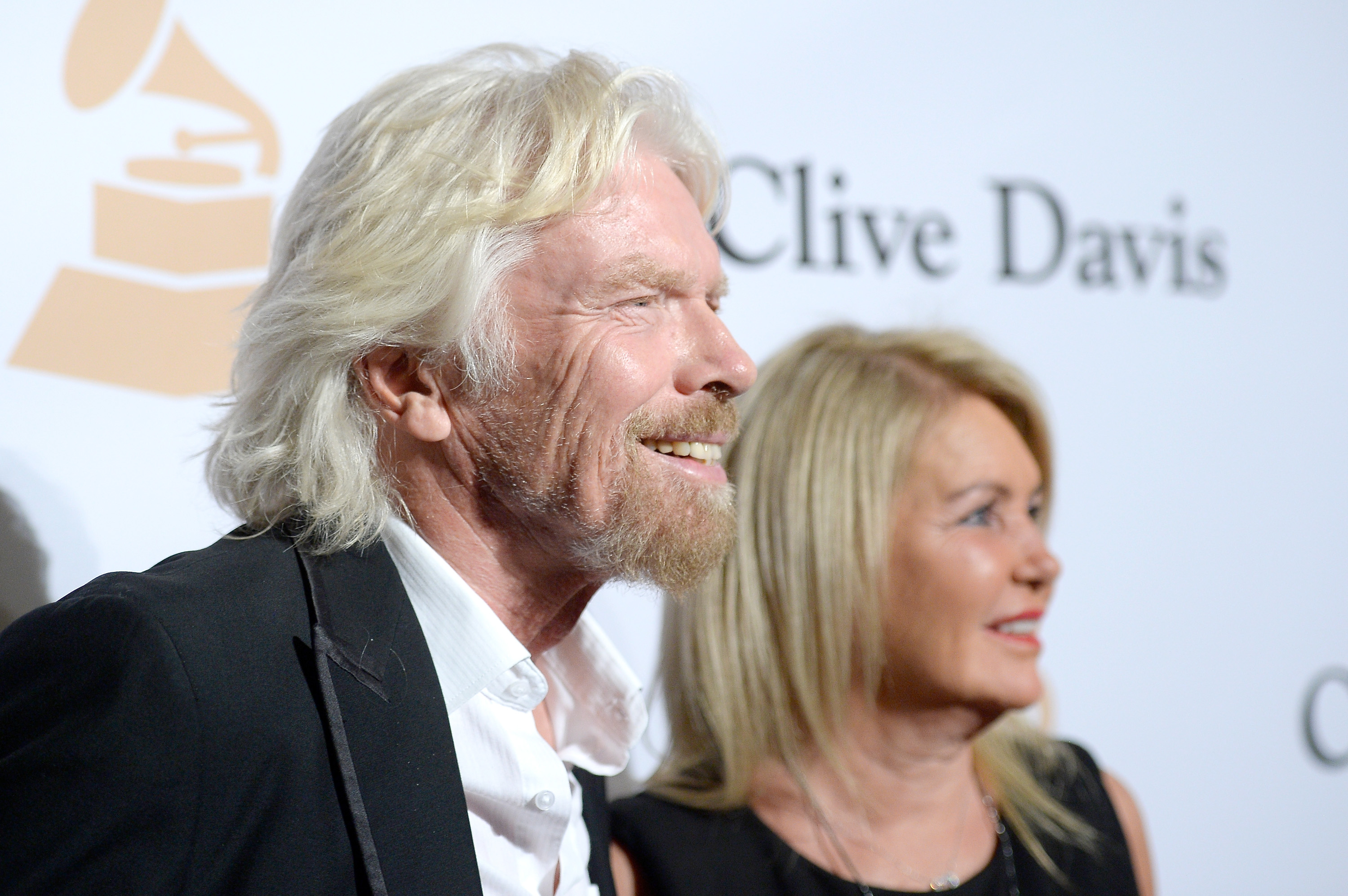 Richard Branson and Joan Templeman at the 2016 Pre-Grammy Gala and Salute to Industry Icons honoring Irving Azoff on February 14 in Beverly Hills, California. | Source: Getty Images