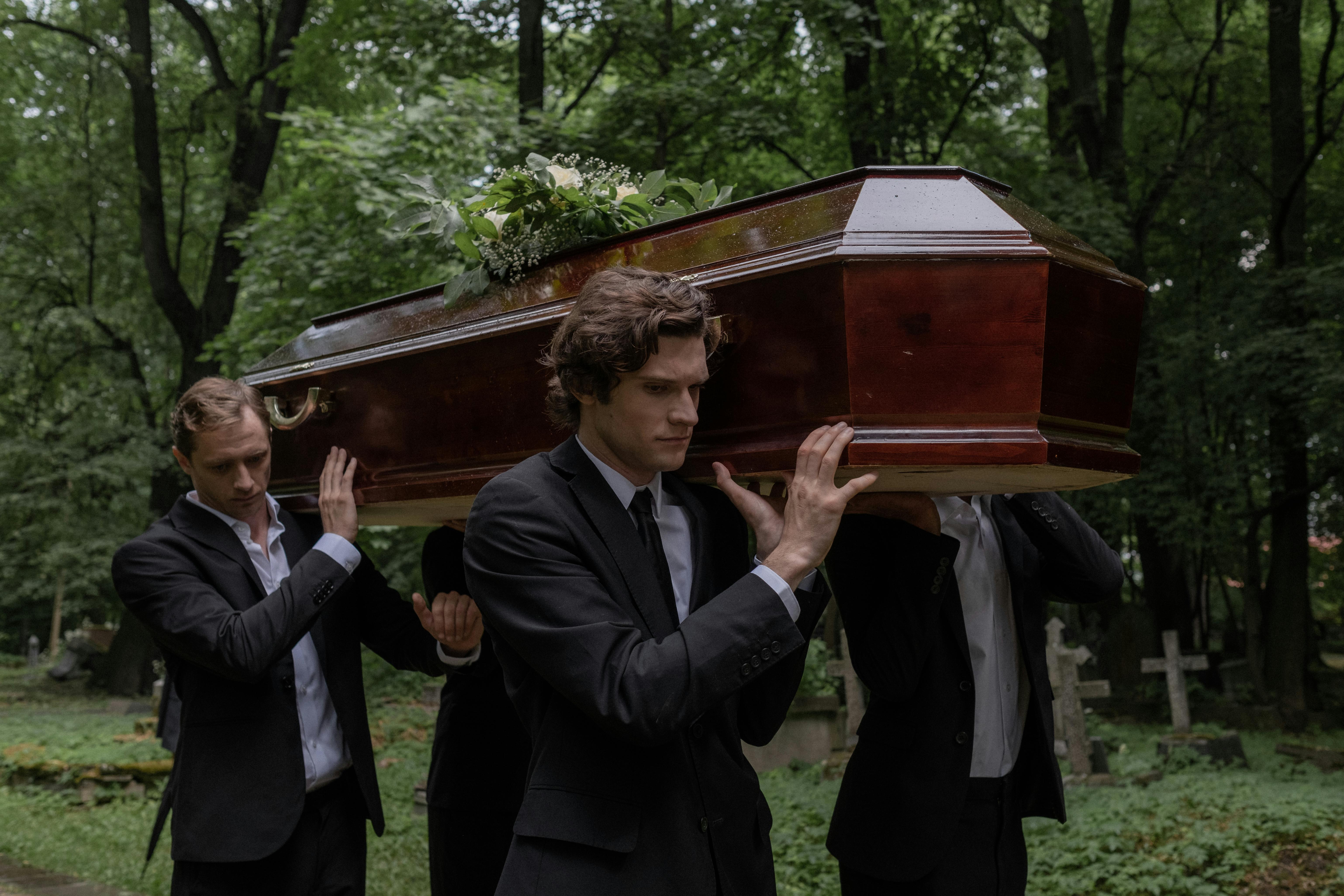 People carrying a coffin | Source: Pexels