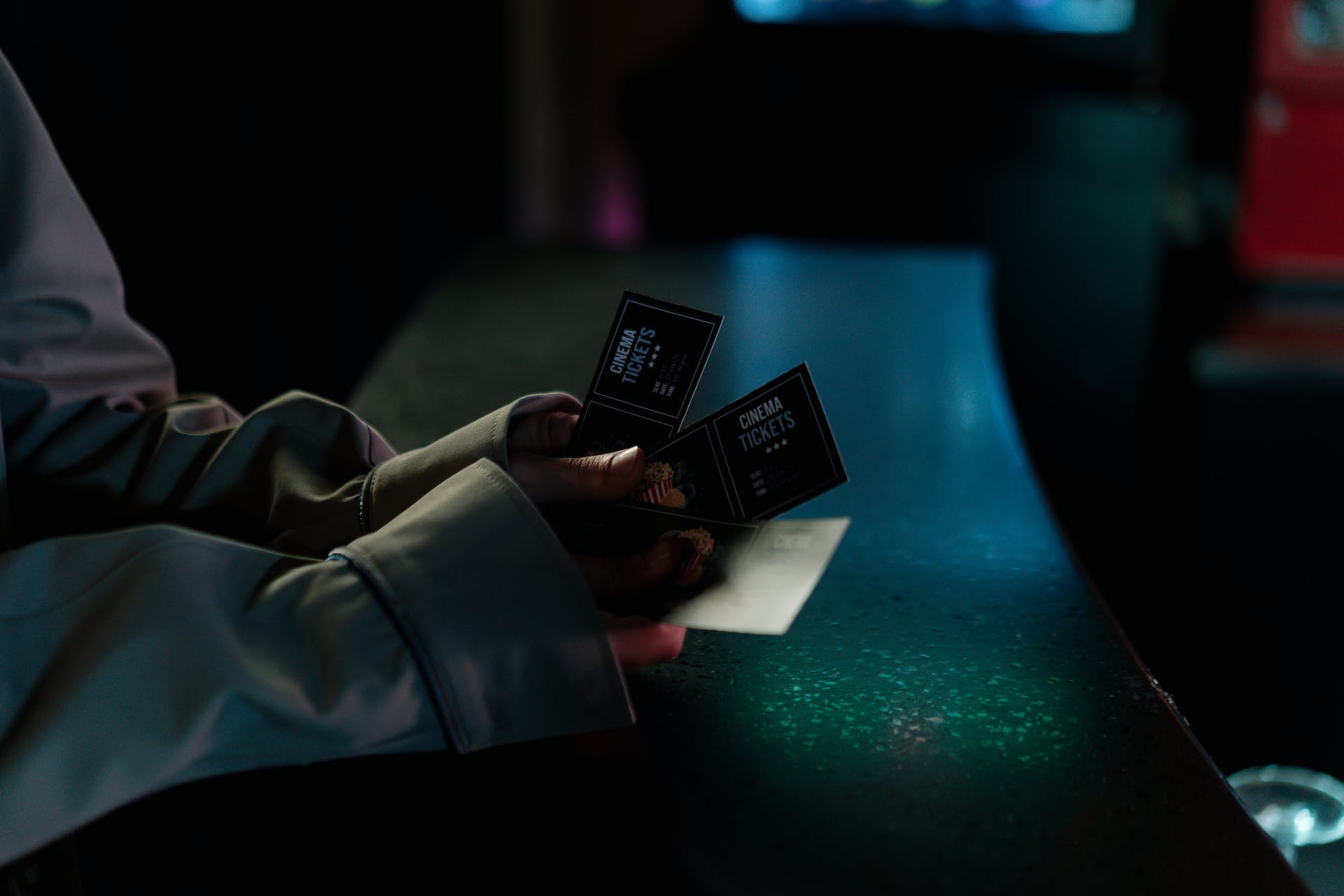 A person holding cinema tickets | Source: Pexels