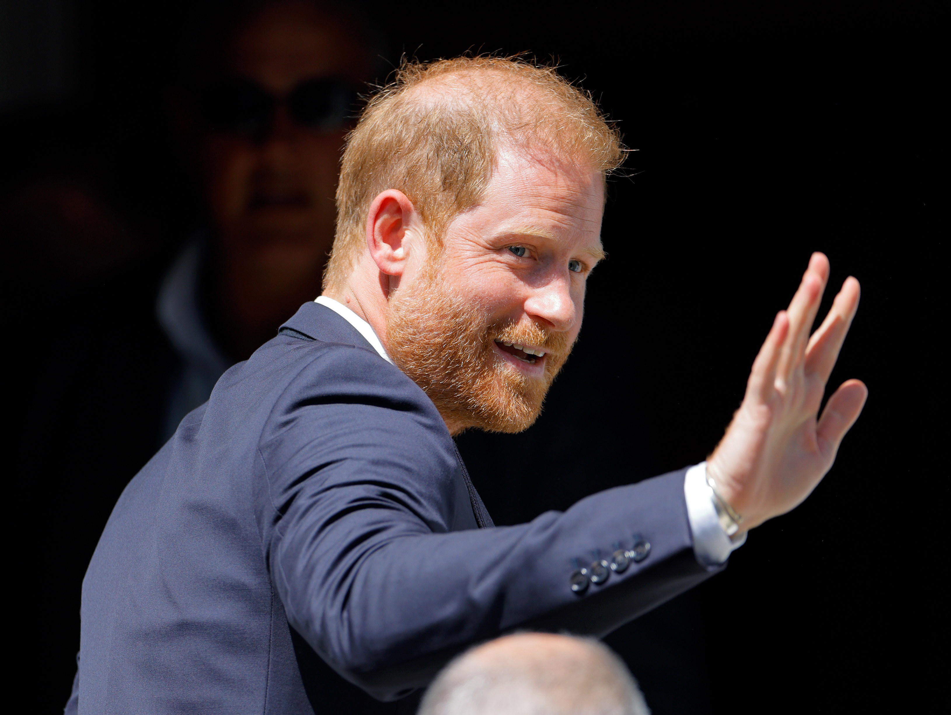 Harry greeted attendees as he arrived at the Invictus Games Foundation's "From Policy to Practice" discussion in London. The engagement marked the start of a U.K. visit that initially appeared to be another solo trip. | Source: Getty Images