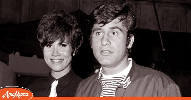 Married American actors James Farentino and Michele Lee walking arm-in-arm at the Daisy Club. Lee has Beatles haircut and wears a dark shirt with a white tie. circa 1965 | Source :Getty Images