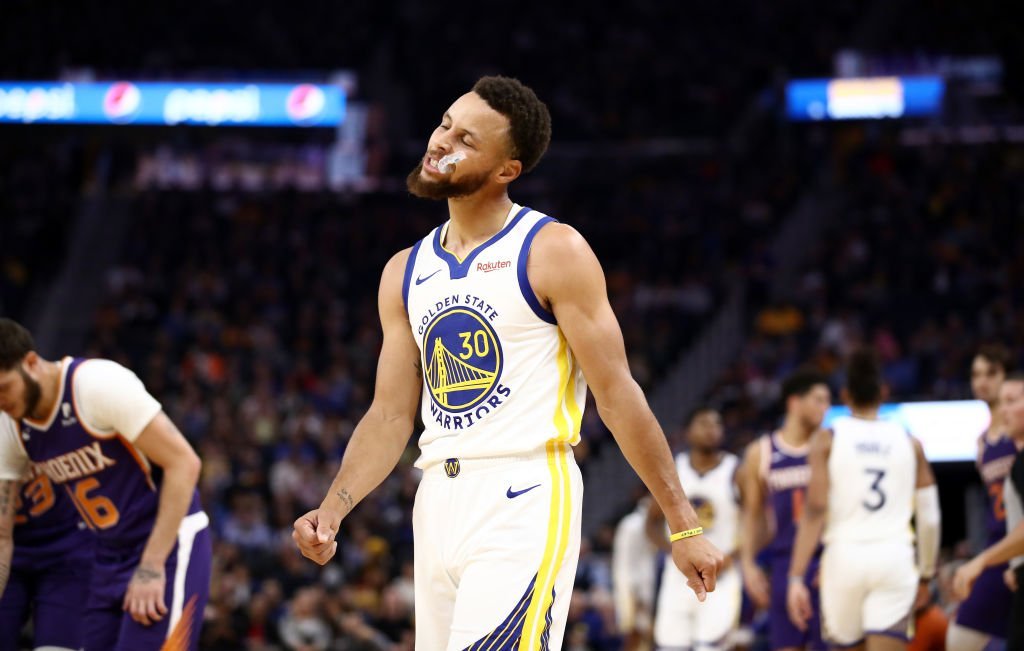 Stephen Curry #30 of the Golden State Warriors reacts during the first half of their game against the Phoenix Suns at Chase Center | Photo: Getty Images