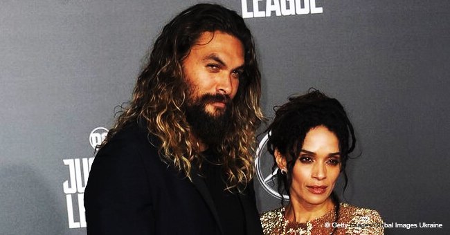 Lisa Bonet stuns in butterfly print dress as she holds hands with hubby Jason at recent event