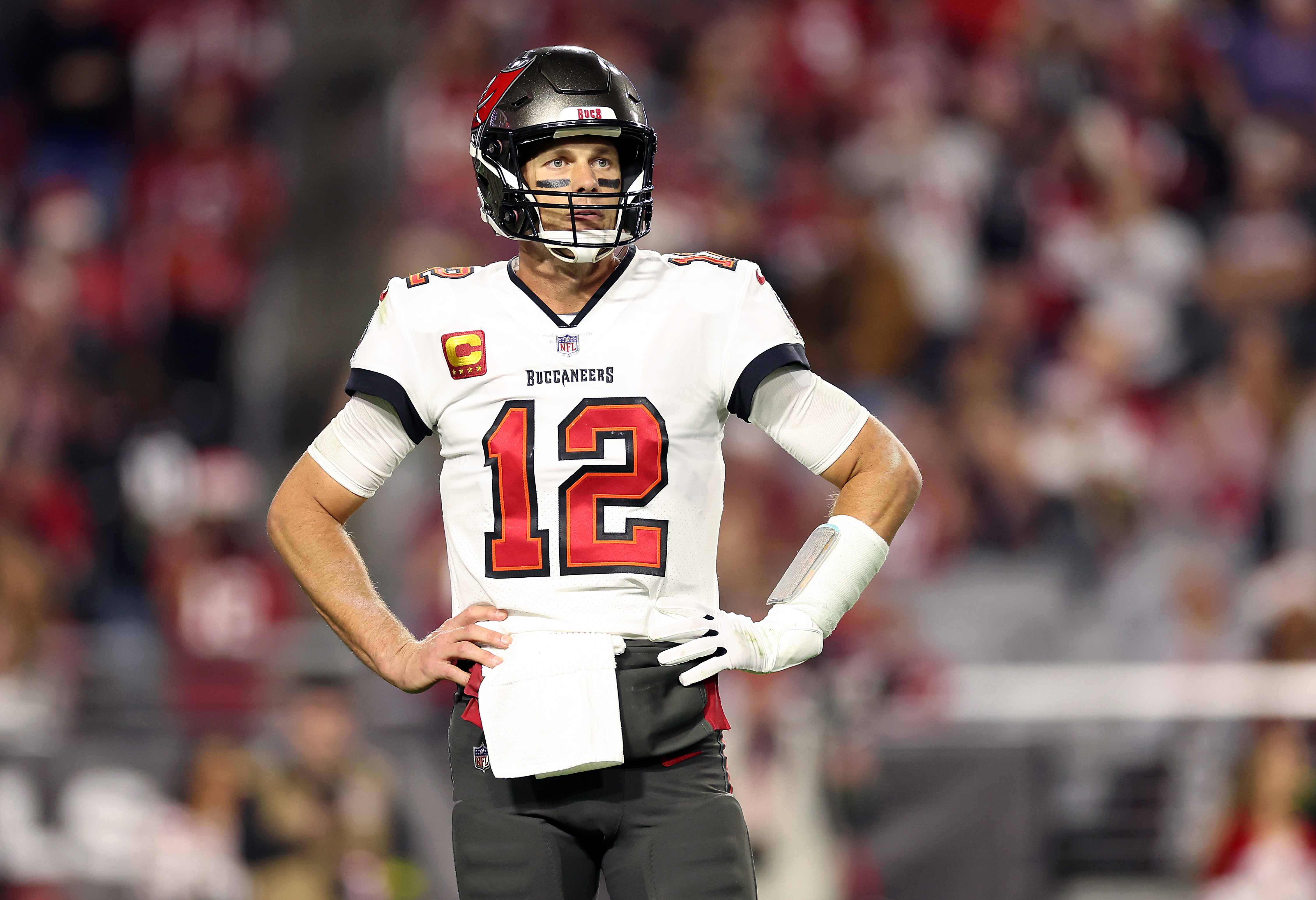Tom Brady #12 of the Tampa Bay Buccaneers reacts after a turnover on downs during the 3rd quarter of the game against the Arizona Cardinals at State Farm Stadium on December 25, 2022 in Glendale, Arizona. | Source: Getty Images