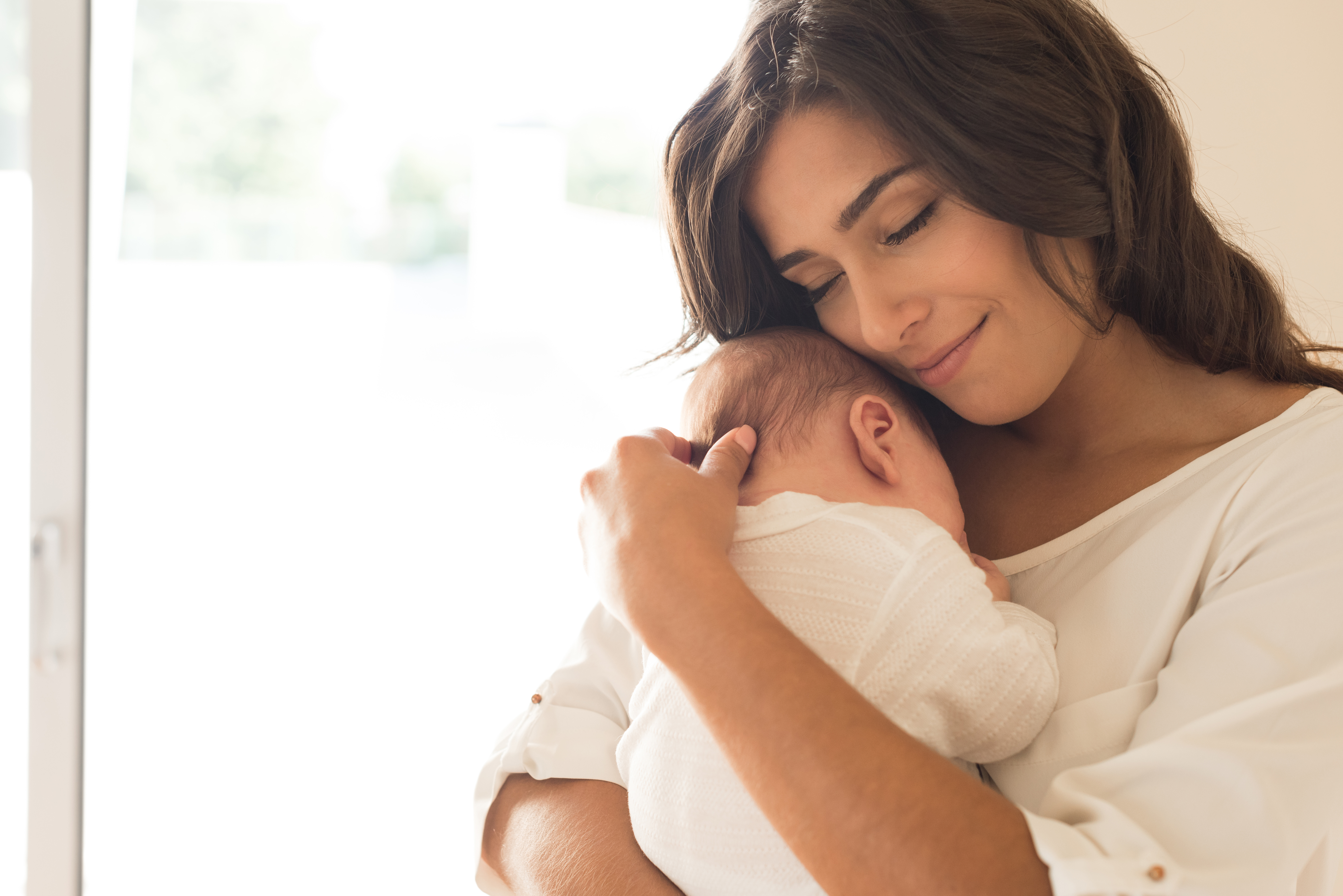 A woman and her child | Source: Shutterstock