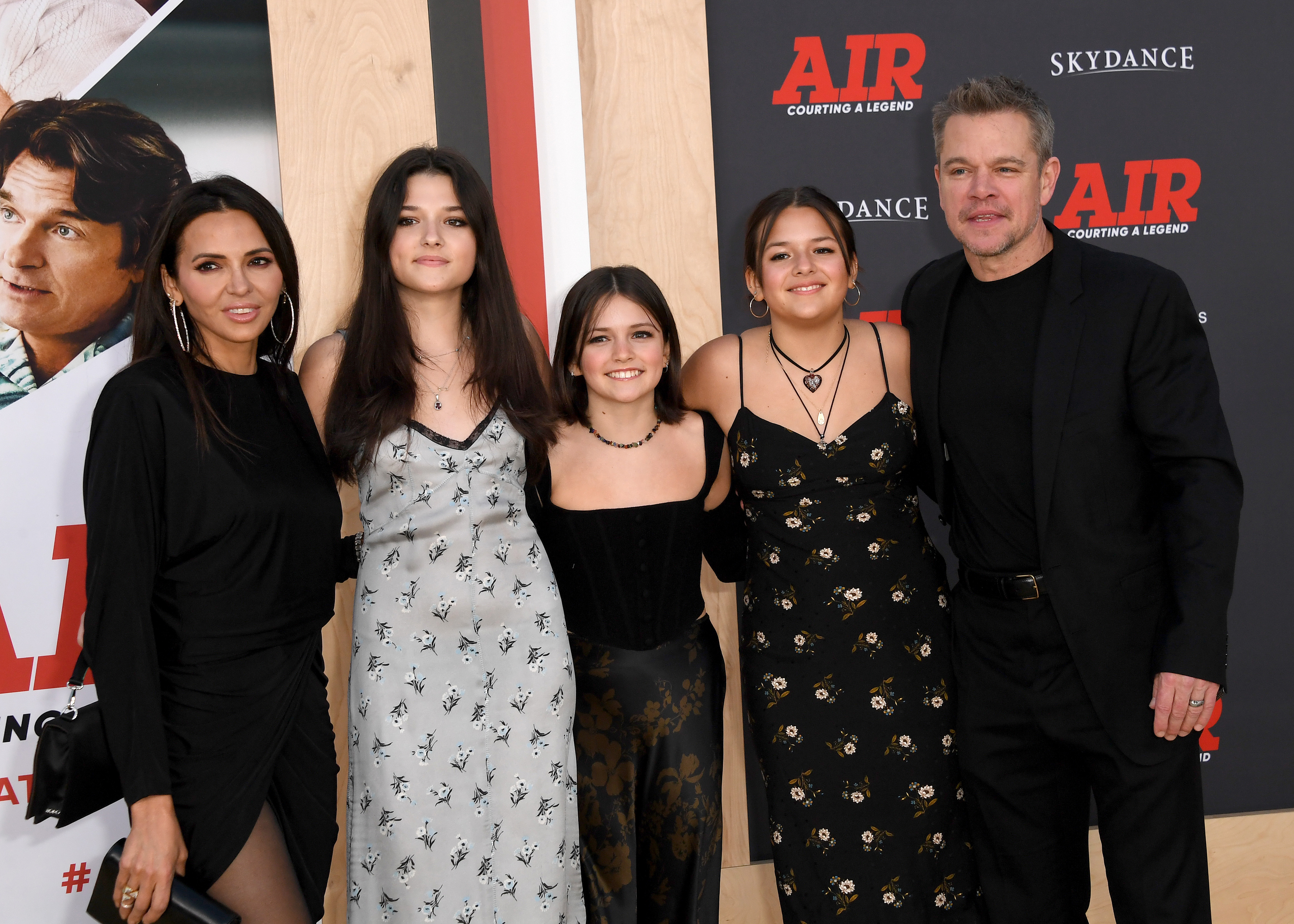 Matt Damon poses with wife Luciana Damon and daughters Alexia Barroso, Isabella Damon, Gia Damon, and Stella Damon at the Los Angeles premiere of "Air" in 2023. | Source: Getty Images
