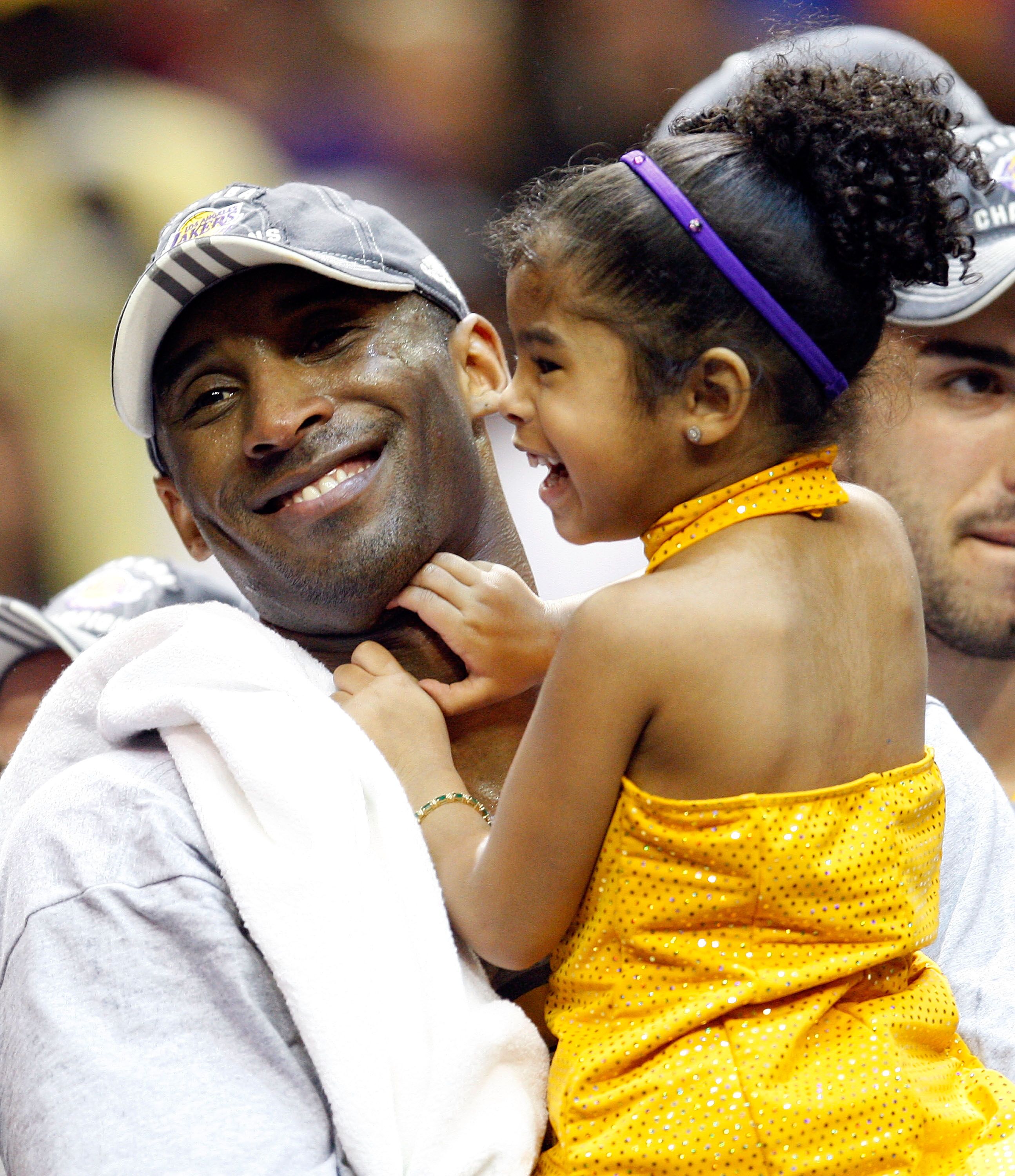 Kobe Bryant and his daughter GiGi at one of the LA Lakers' games | Source: Getty Images/GlobalImagesUkraine