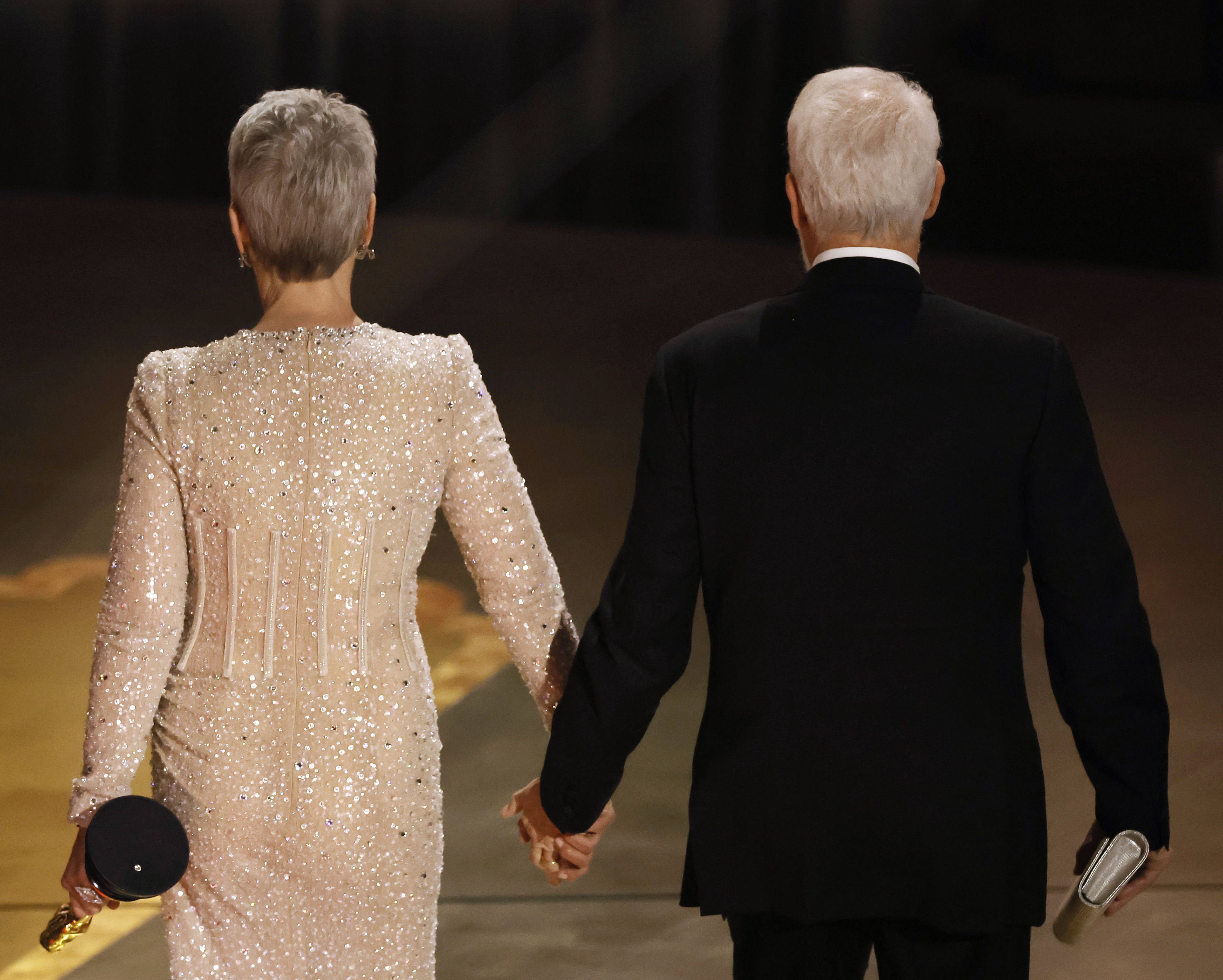 Jamie Lee Curtis, Best Supporting Actress for "Everything Everywhere All at Once," and Christopher Guest attend the 95th Annual Academy Awards at Dolby Theatre on March 12, 2023 in Hollywood, California. | Source: Getty Images