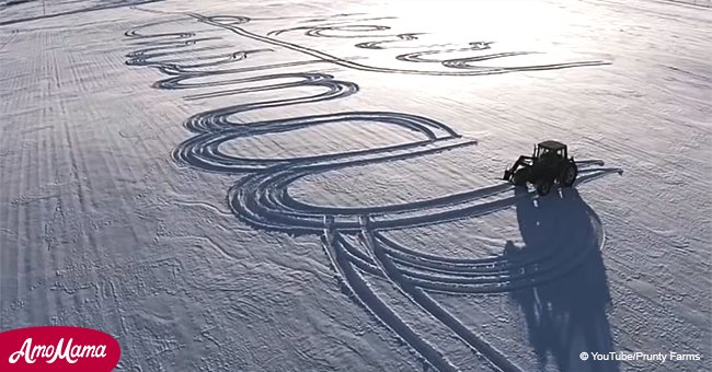 Tractor driver probably made one of the biggest Christmas cards in the world