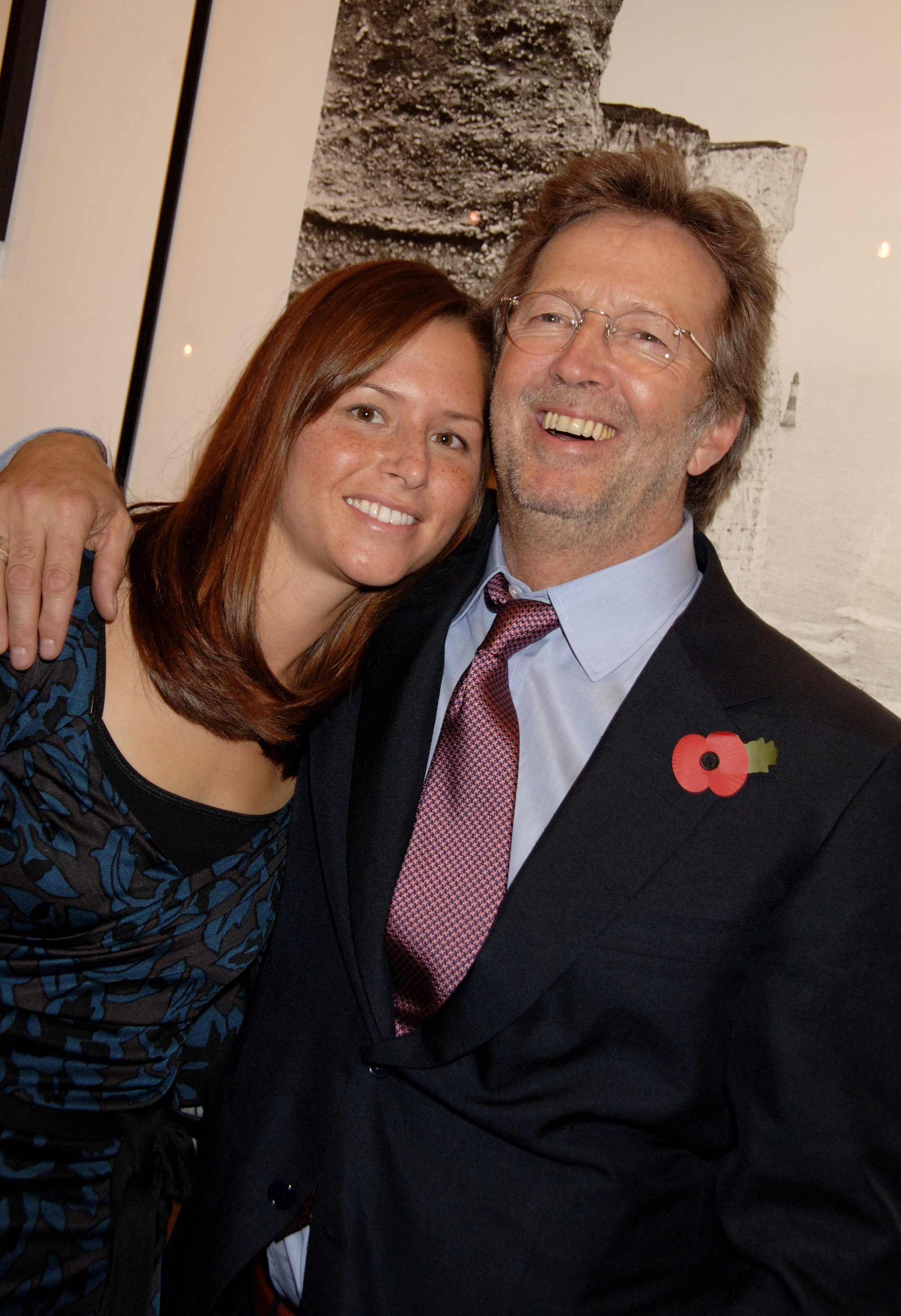 Eric Clapton and Melia McEnery  celebrating his book "Eric Clapton: The Autobiography" on November 1, 2007, in London, England | Source: Getty Images