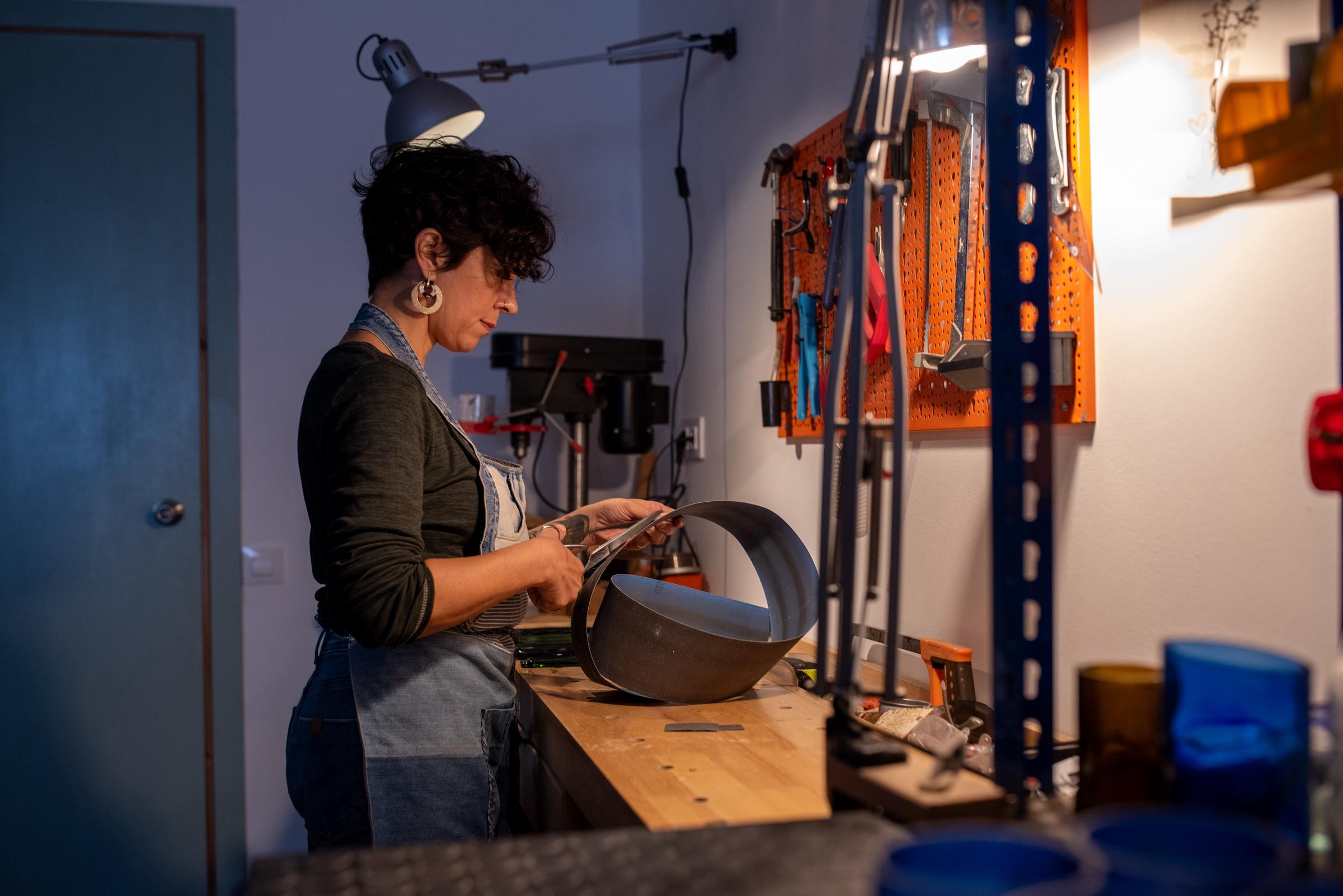 A working diligently in her workshop | Source: Getty Images