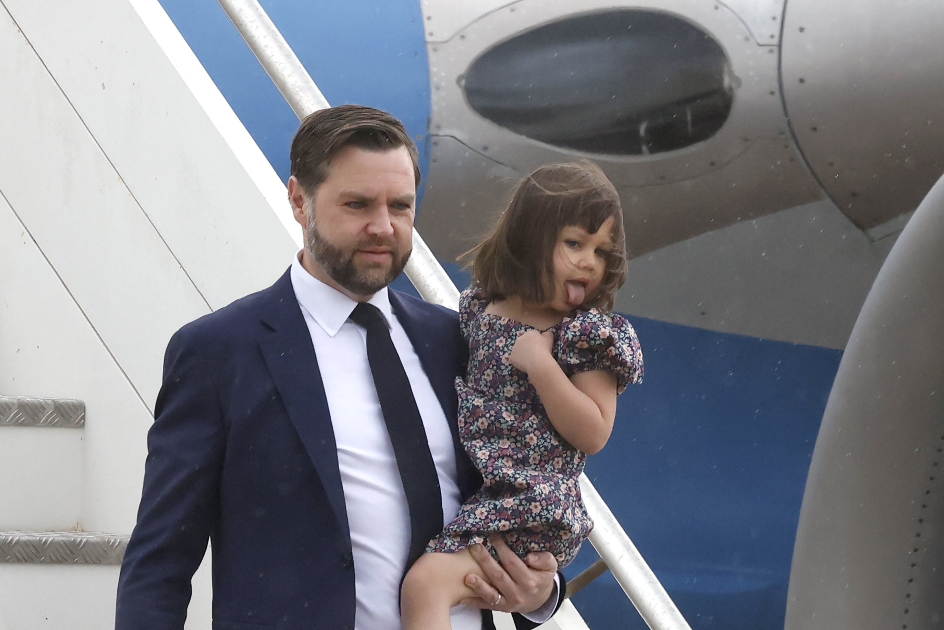 It was clear from just a few photos that Mirabel had an exuberant personality. In this photo, J.D. Vance held his child as he disembarked at Ciampino Airport on April 18, 2025, in Rome, Italy. | Source: Getty Images