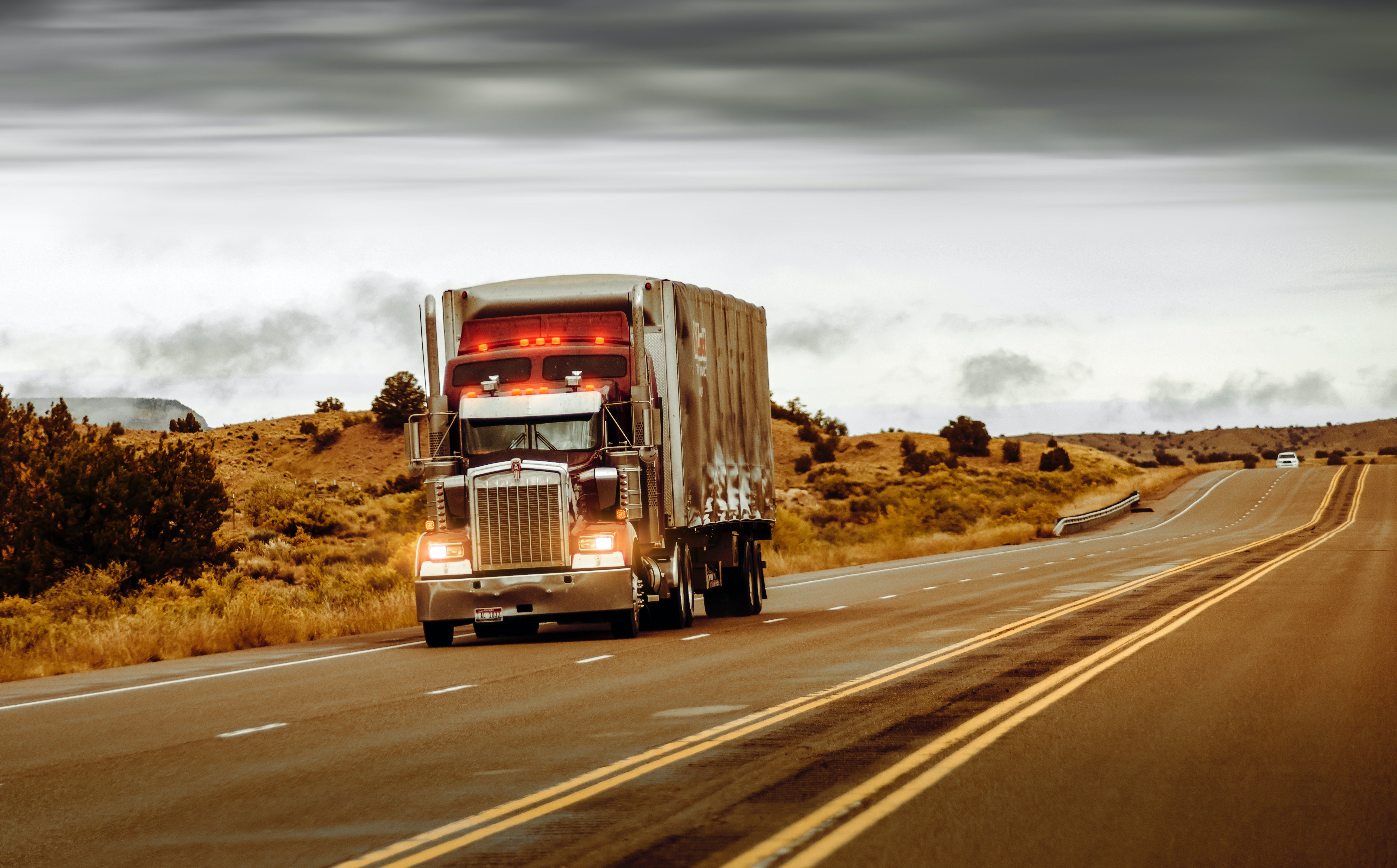 Pictured - An image of a white and brown truck on the road | Source: Pexels 