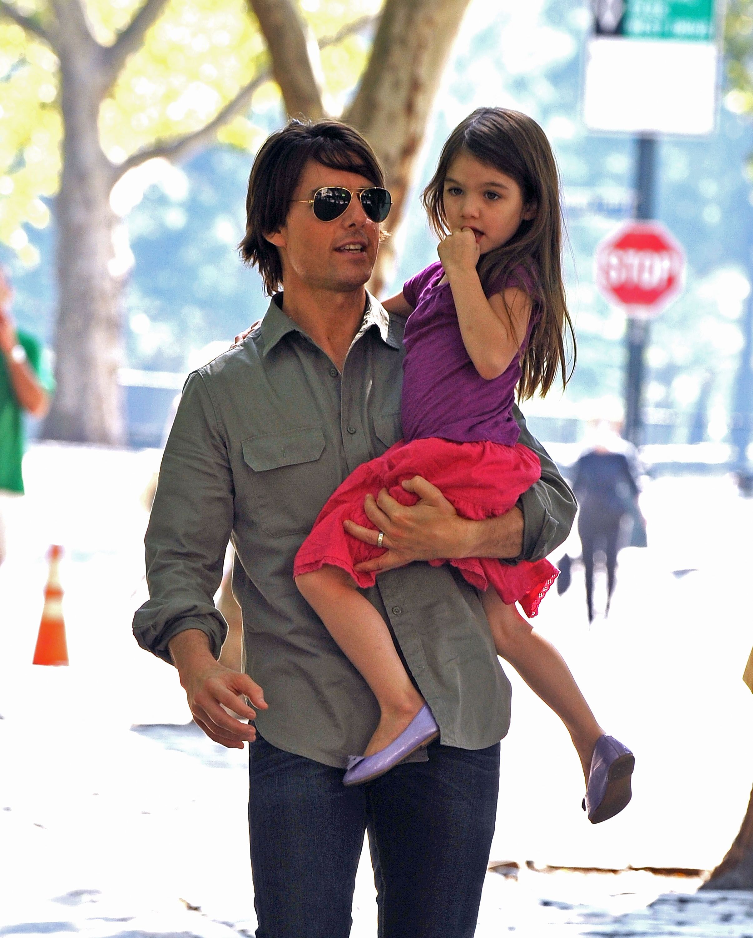Tom and Suri Cruise visit a Central Park West playground on September 7, 2010, in New York City. | Source: James Devaney/WireImage/Getty Images