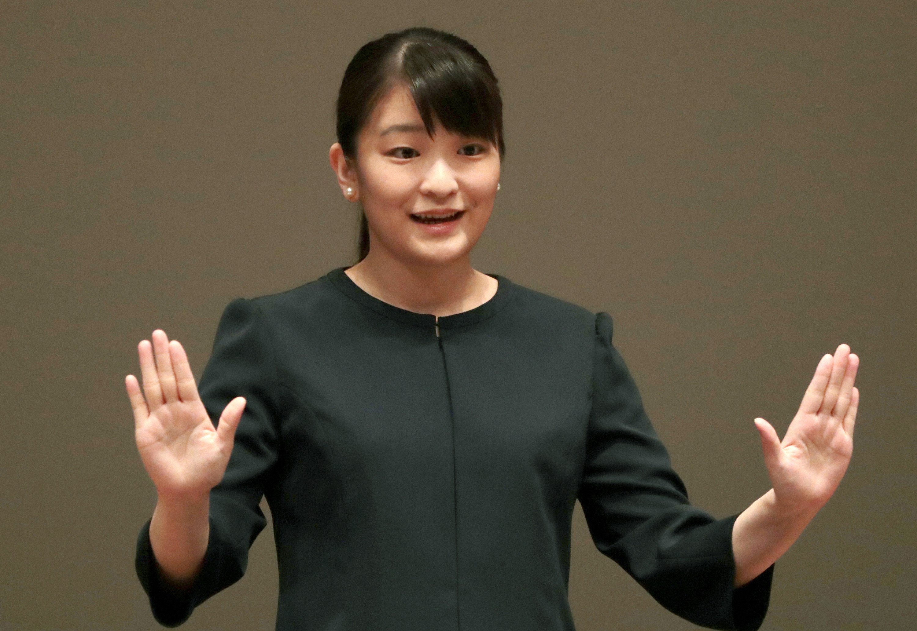 Princess Mako of Akishino speaks with finger language at the opening ceremony of the National High School Student Finger Language Contest at Yurakucho Asahi Hall on August 24, 2019 in Tokyo, Japan | Source: Getty Images