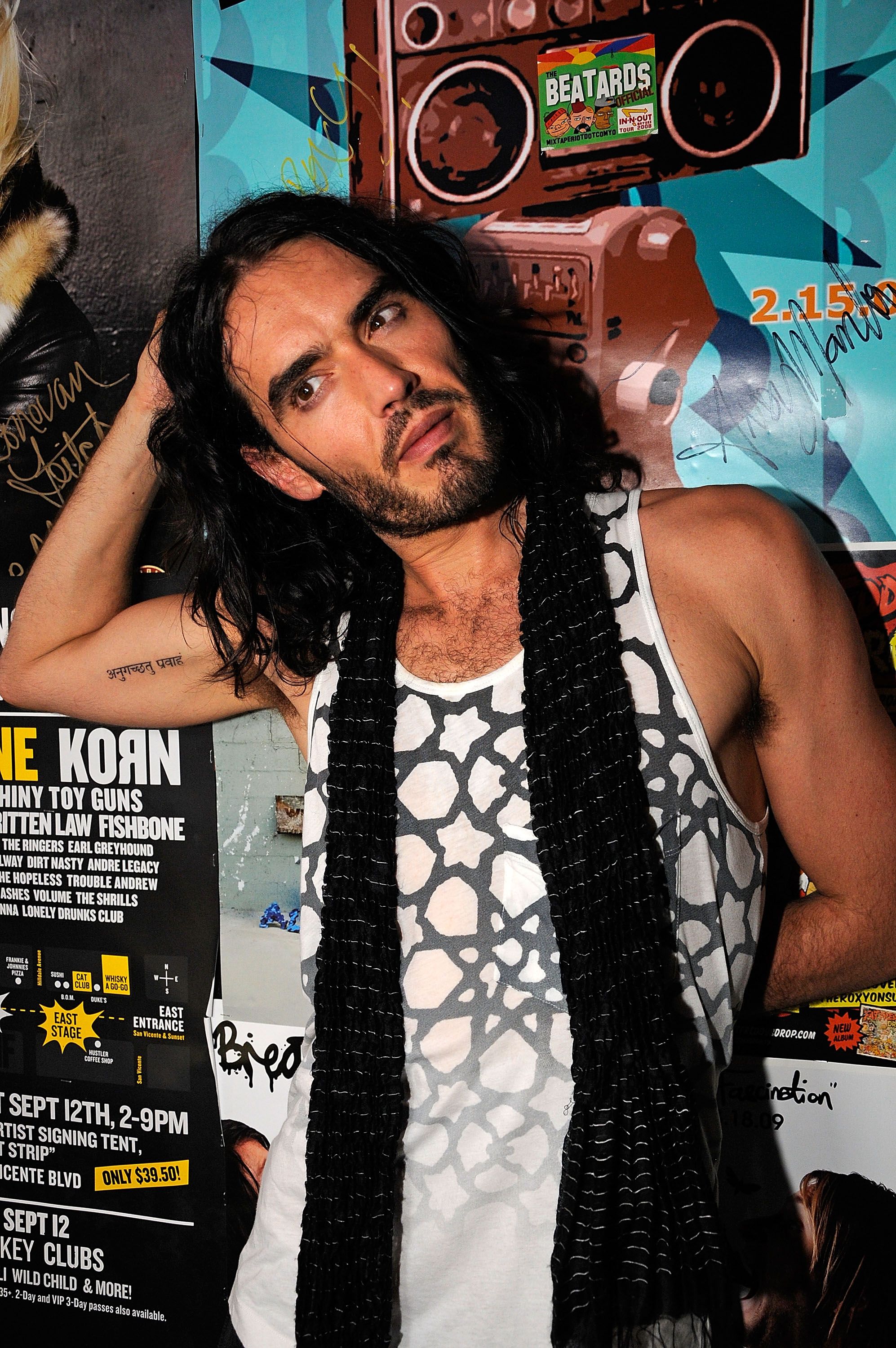 Russell Brand backstage following a concert to promote the film "Get Him To The Greek" in 2010 in West Hollywood | Source: Getty Images