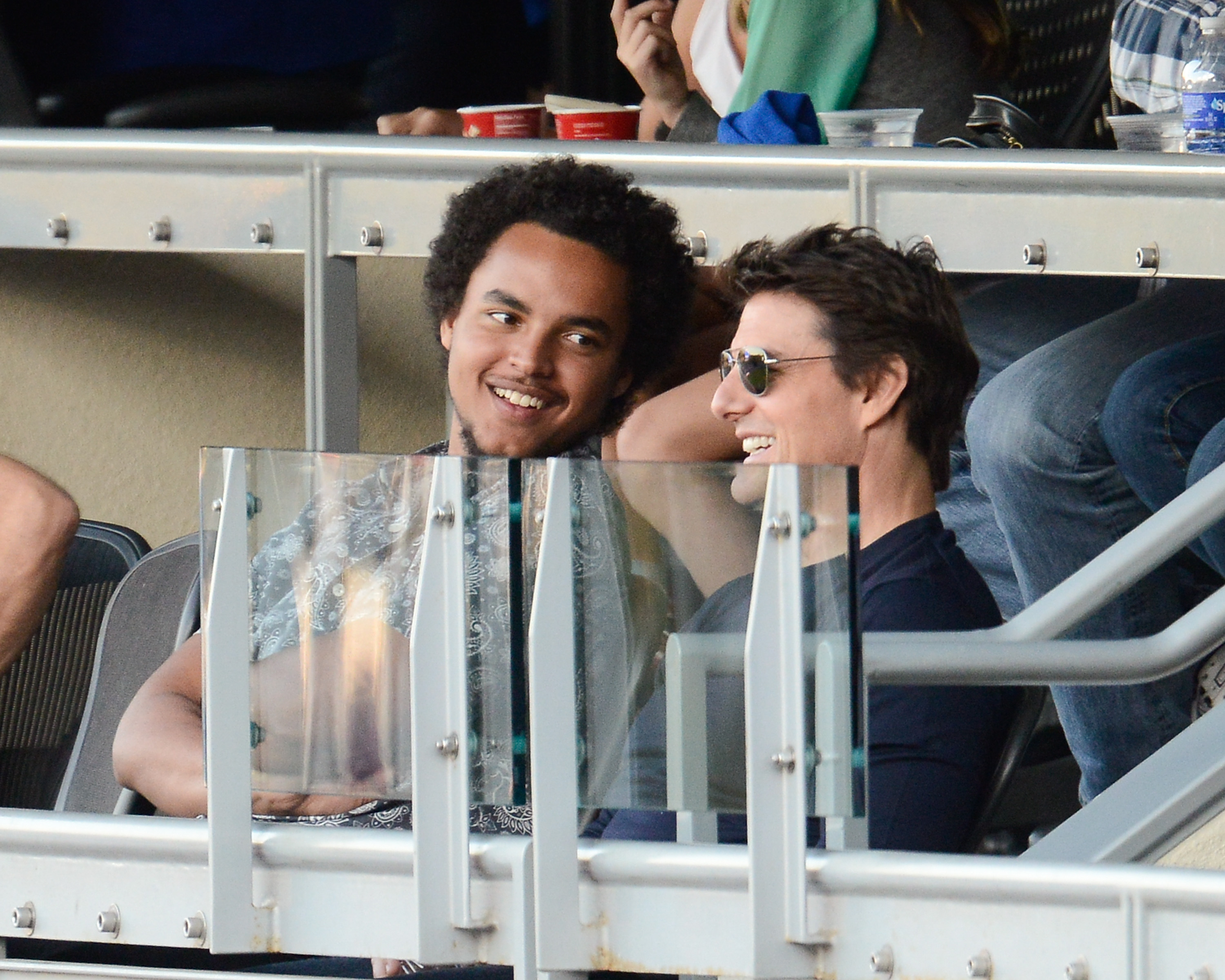 Connor and Tom Cruise at the National League Championship Series at Dodger Stadium in October 2013 | Source: Getty Images