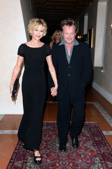 John Mellencamp and Meg Ryan at Teatro Antico on June 20, 2013 in Taormina, Italy | Photo: Getty Images