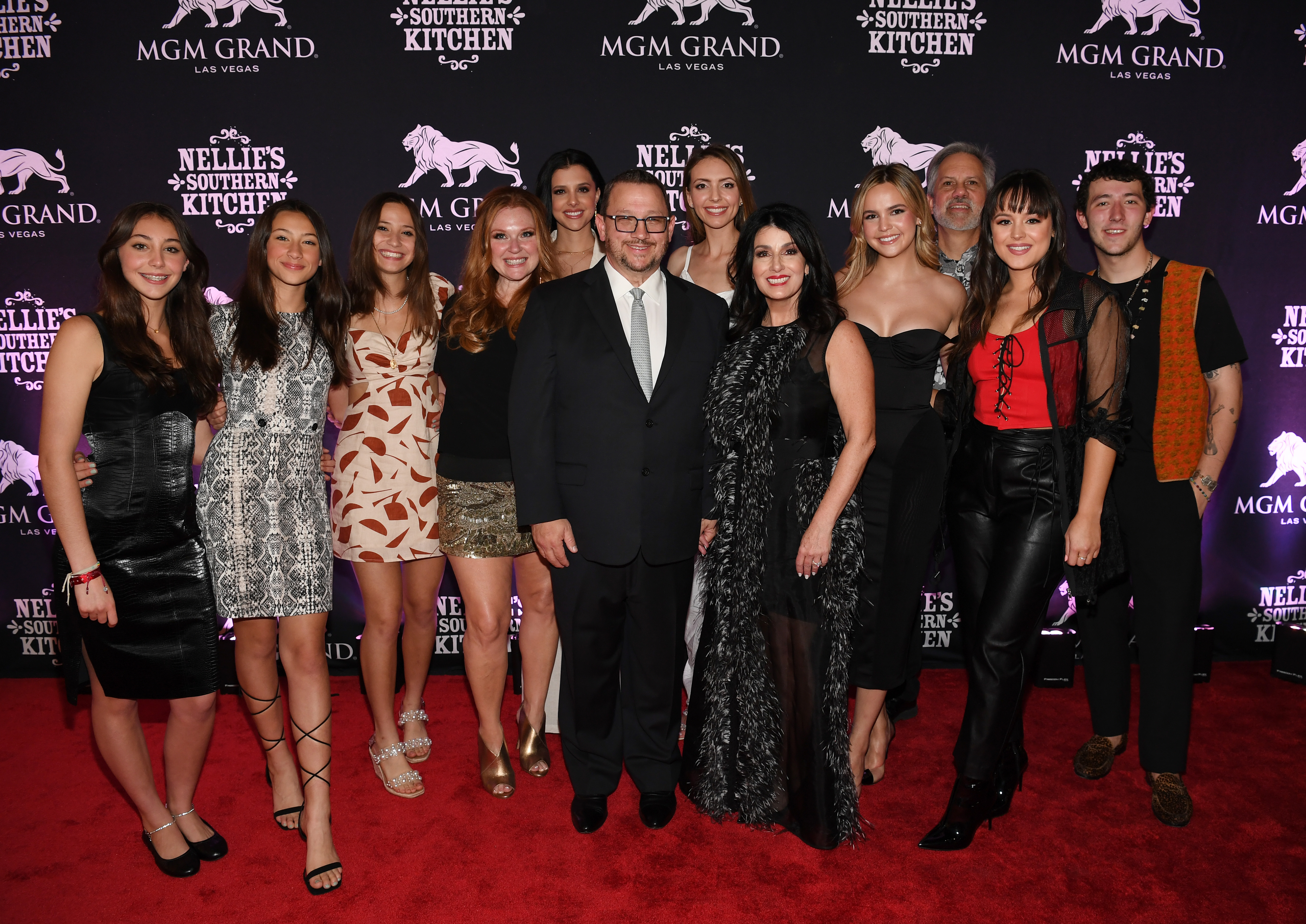 Musical group Hello Sister, Terri Jo Box, Lanie Gardner, Kevin Jonas Sr., Olivia "LIVVIA" Somerlyn, Denise Jonas, Bailee Madison, Phil Guerini, Hayley Orrantia and Frankie Jonas at the grand opening of Nellie's Southern Kitchen on June 4, 2022, in Las Vegas. | Source: Getty Images