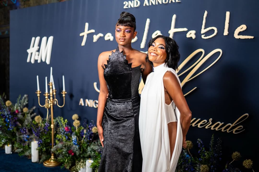Zaya Wade poses alongside Gabrielle Union at the 2nd Annual Translatable Ball, standing before a floral-lined backdrop accented by gold candelabras. | Source: Instagram/translatableproject