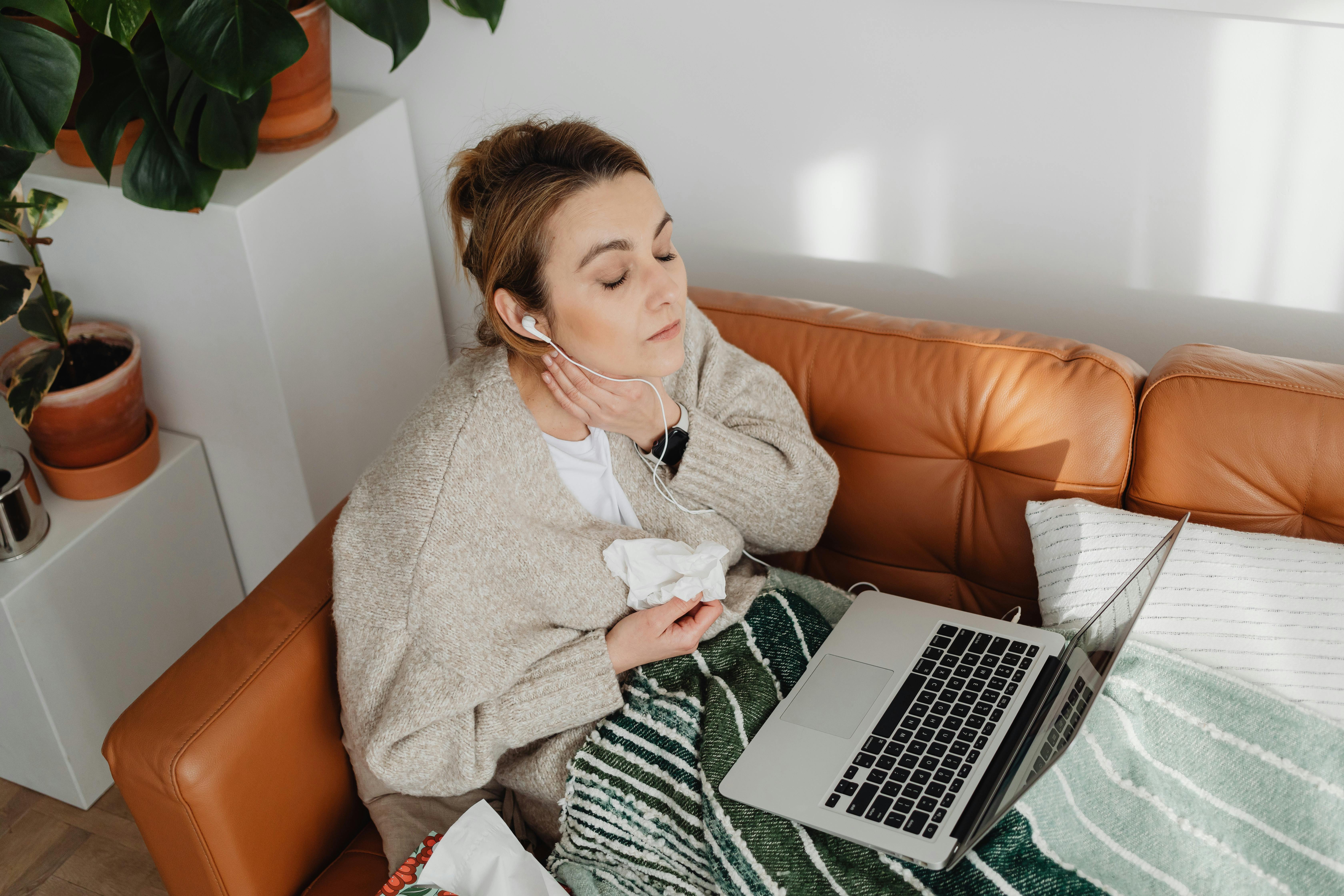 A woman resting at home | Source: Pexels