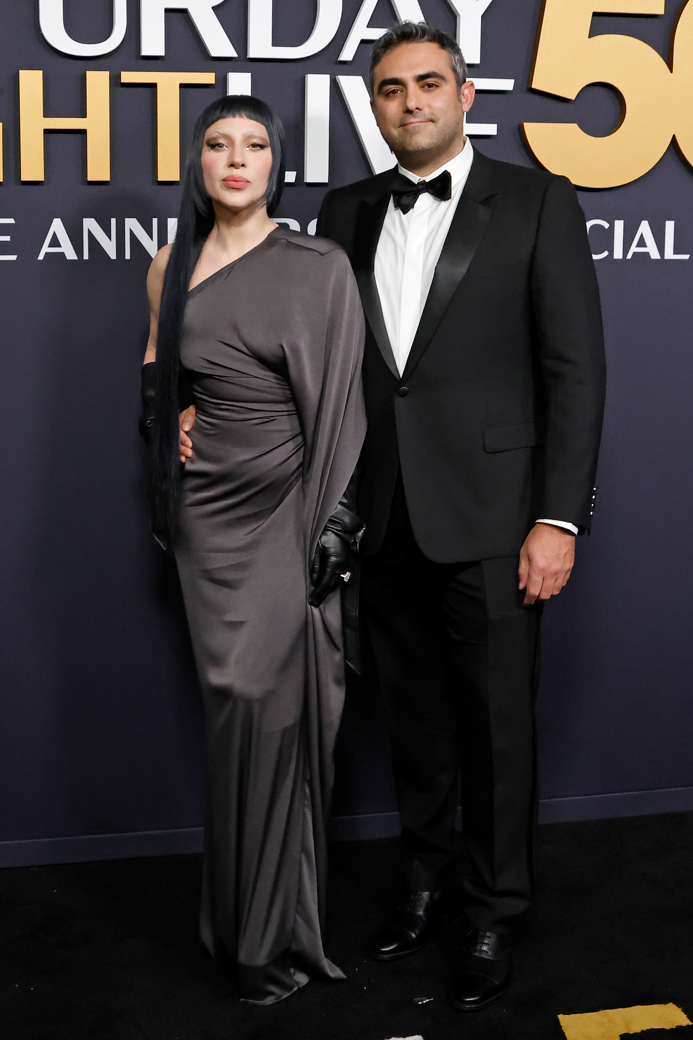 Lady Gaga and Michael Polansky arrive at "SNL50: The Anniversary Special" on February 16, 2025, in New York City. | Source: Getty Images