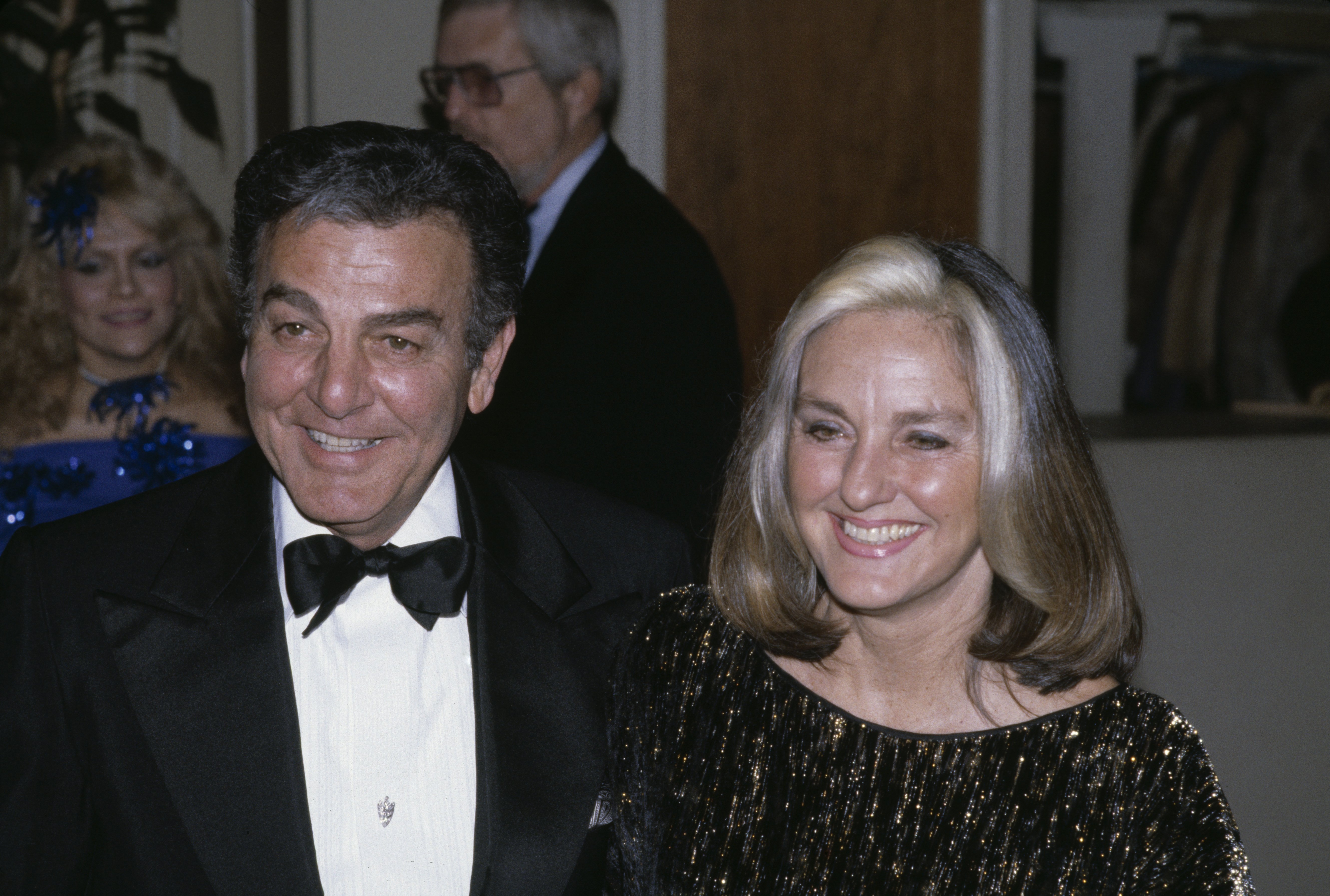 American actor Mike Connors and his wife, Mary Lou Willey, attend the 40th Annual Golden Globe Awards, held at the Beverly Hilton Hotel in Beverly Hills, California, 29th January 1983 | Source: Getty Images