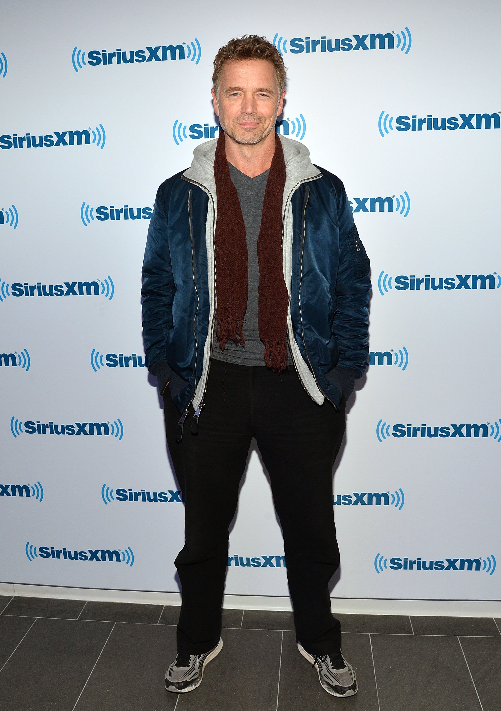 Veteran actor and country singer John Schneider during his 2014 visit in SiriusXM Studios in New York City. | Photo: Getty Images