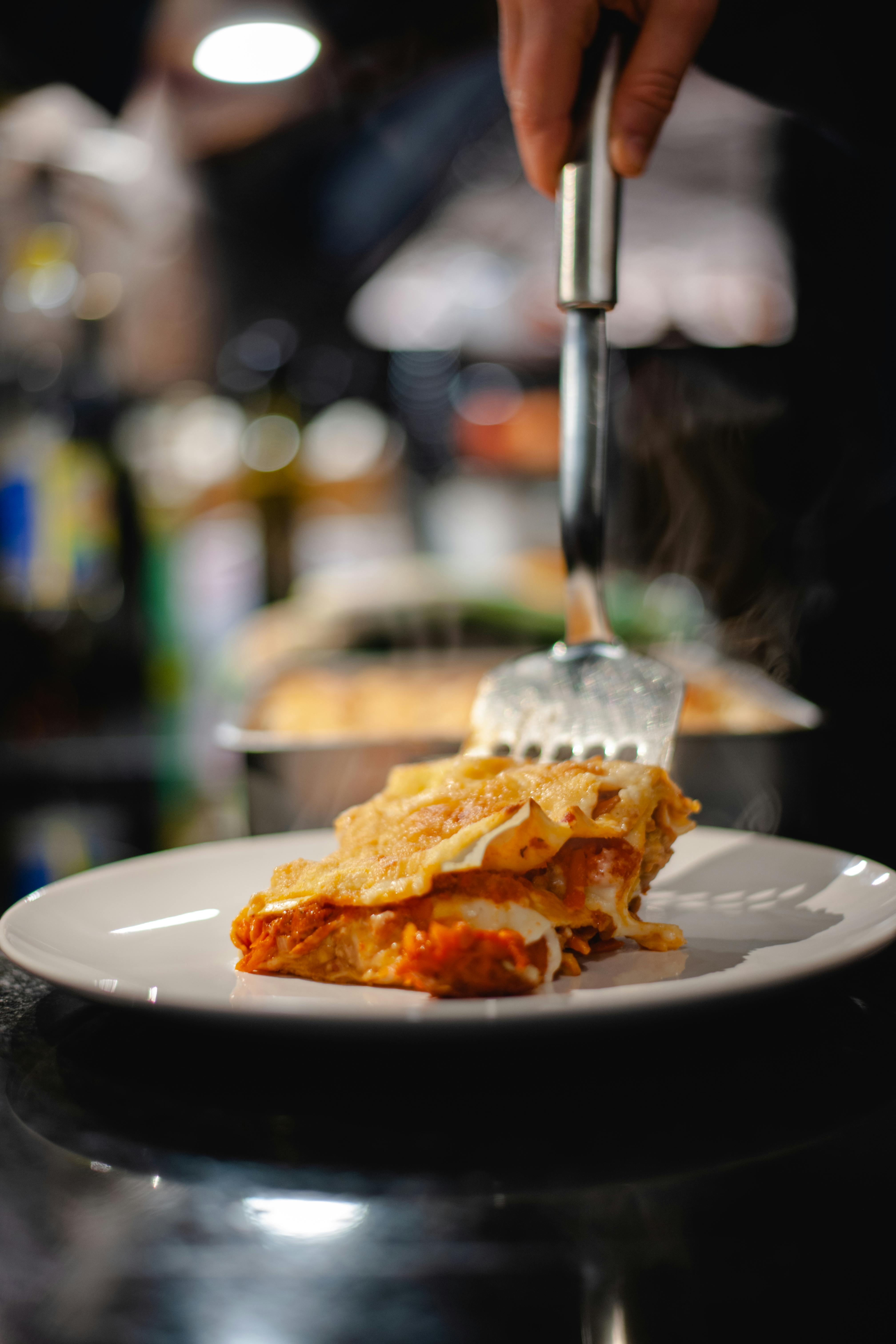 Serving of baked lasagna | Source: Pexels