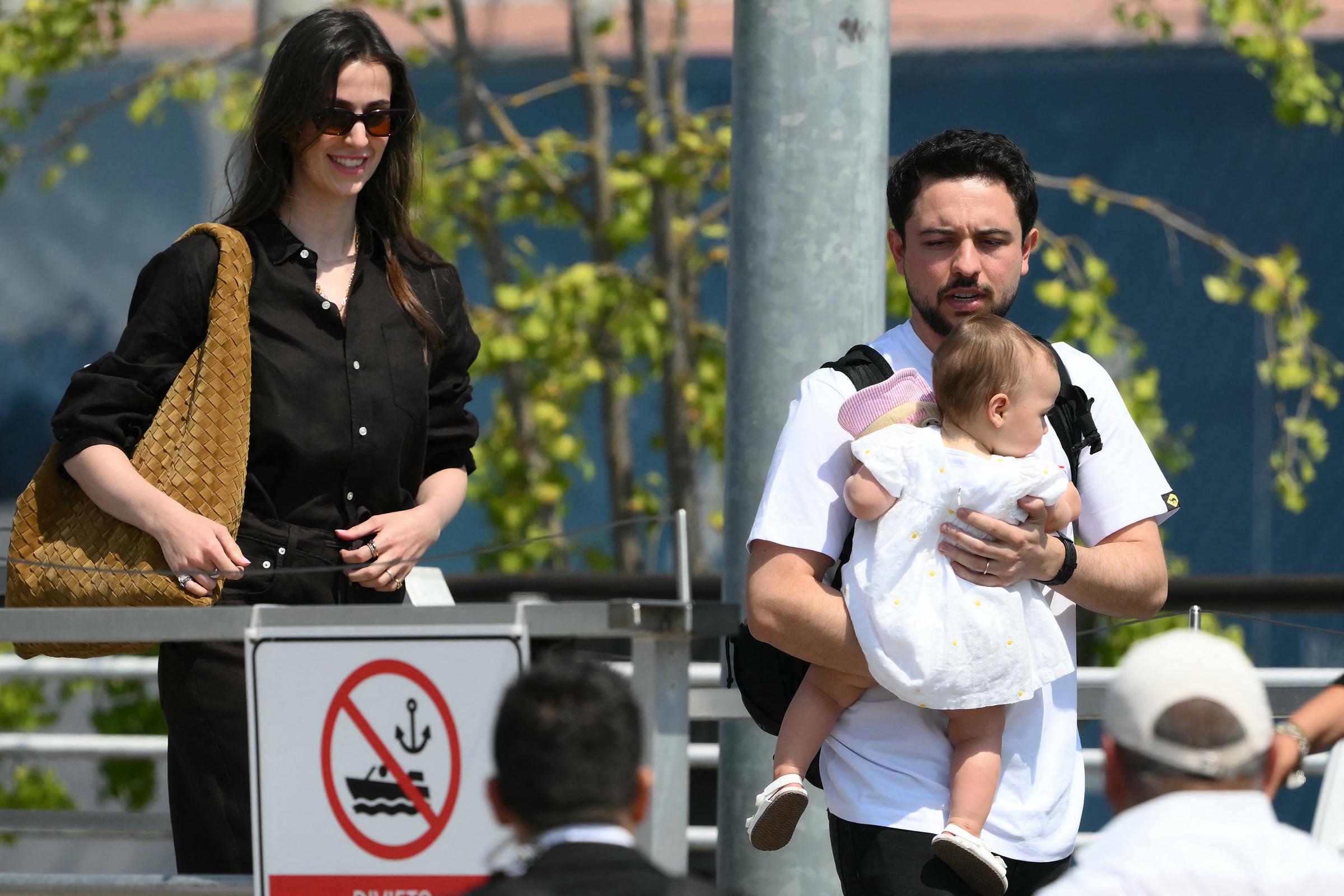 Jordan's Princess Rajwa, Crown Prince of Jordan, Hussein bin Abdullah and their daughter Iman Bint Hussein board a taxi boat after landing at Venice Marco Polo airport. They are headed to the widely talked about wedding of the month between Jeff Bezos and Lauren Sanchez.