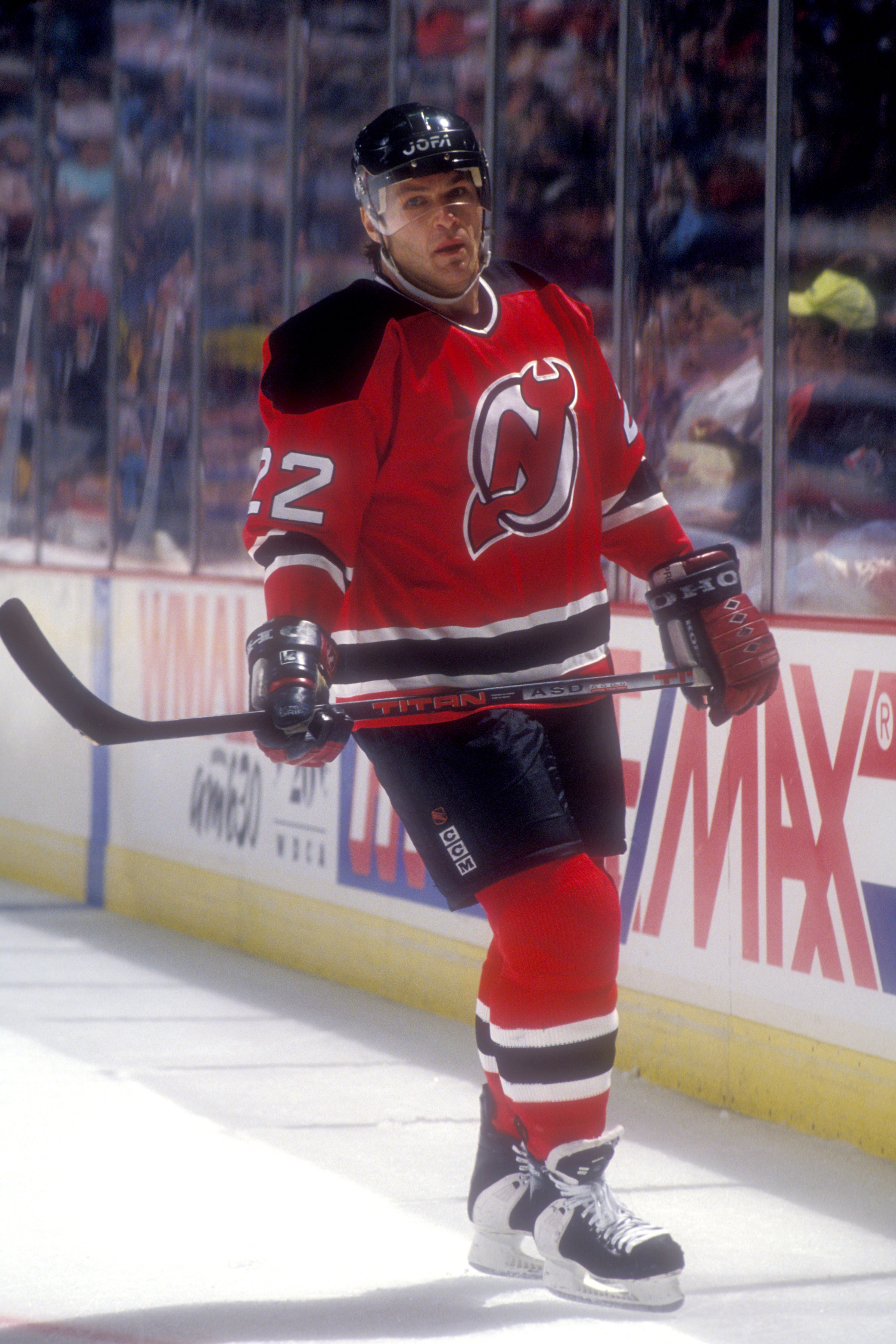 Claude Lemieux #22 of the New Jersey Devils looks on during a hockey game against the Washington Capitals at USAir Arena on April 12, 1995, in Landover, Maryland | Source: Getty Images