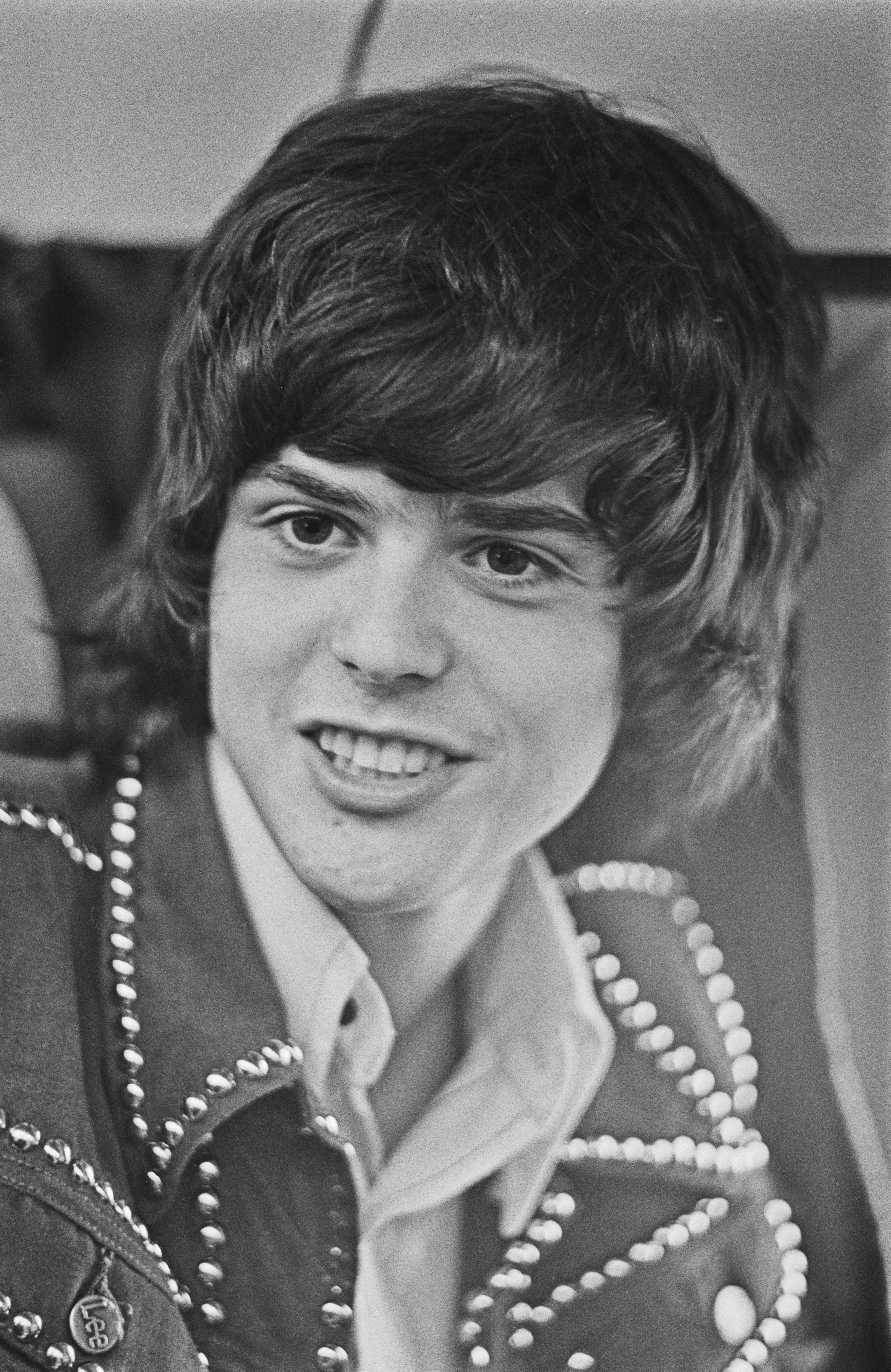 Actor Donny Osmond photographed on board an aircraft with his family in October 1973 in the United Kingdom. | Source: Getty Images