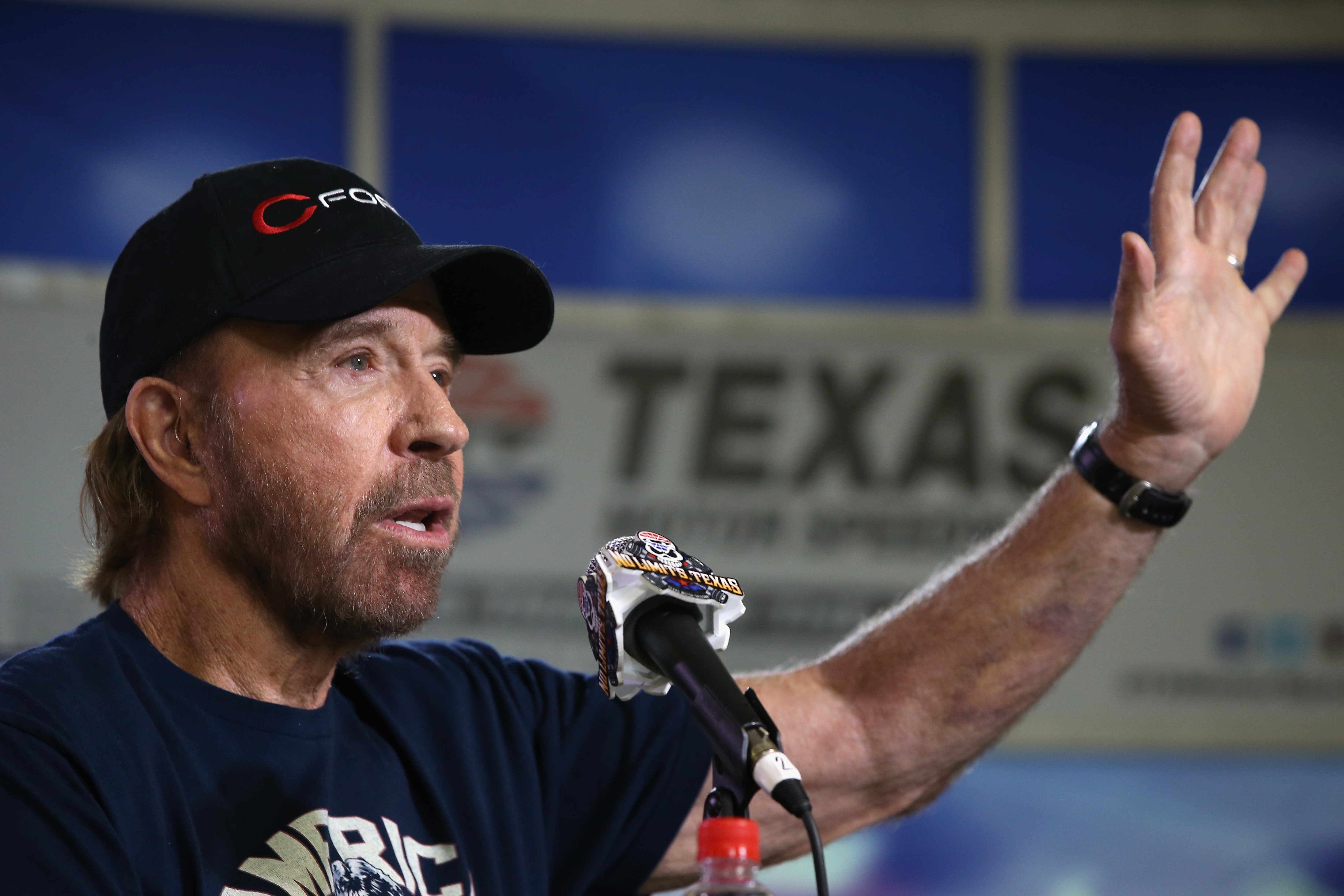 Chuck Norris speaks to the media ahead of the NASCAR Sprint Cup Series AAA Texas 500 on November 6, 2016 | Source: Getty Images