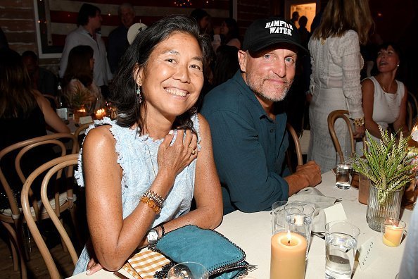  Laura Louie and Woody Harrelson attend Apollo in the Hamptons 2019 on August 03, 2019 | Photo: Getty Images