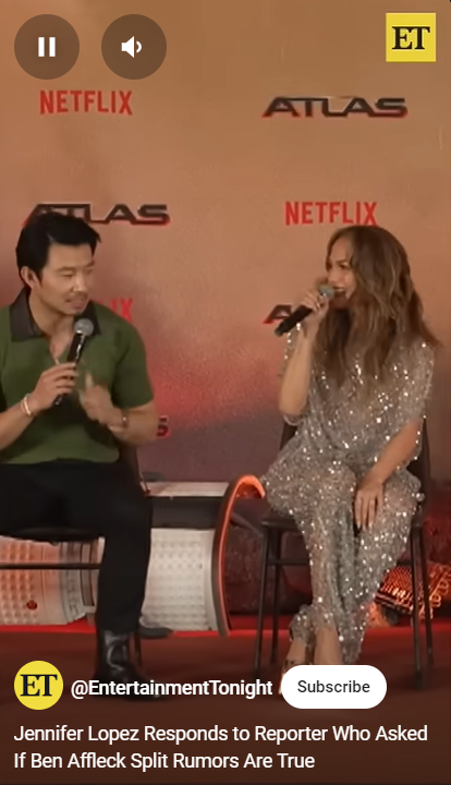 Simu Liu intervenes in the reporter's question as Jennifer Lopez looks at him during a press tour for their movie "Atlas" in Mexico City, as seen in a video shared on May 24, 2024. | Source: YouTube/EntertainmentTonight