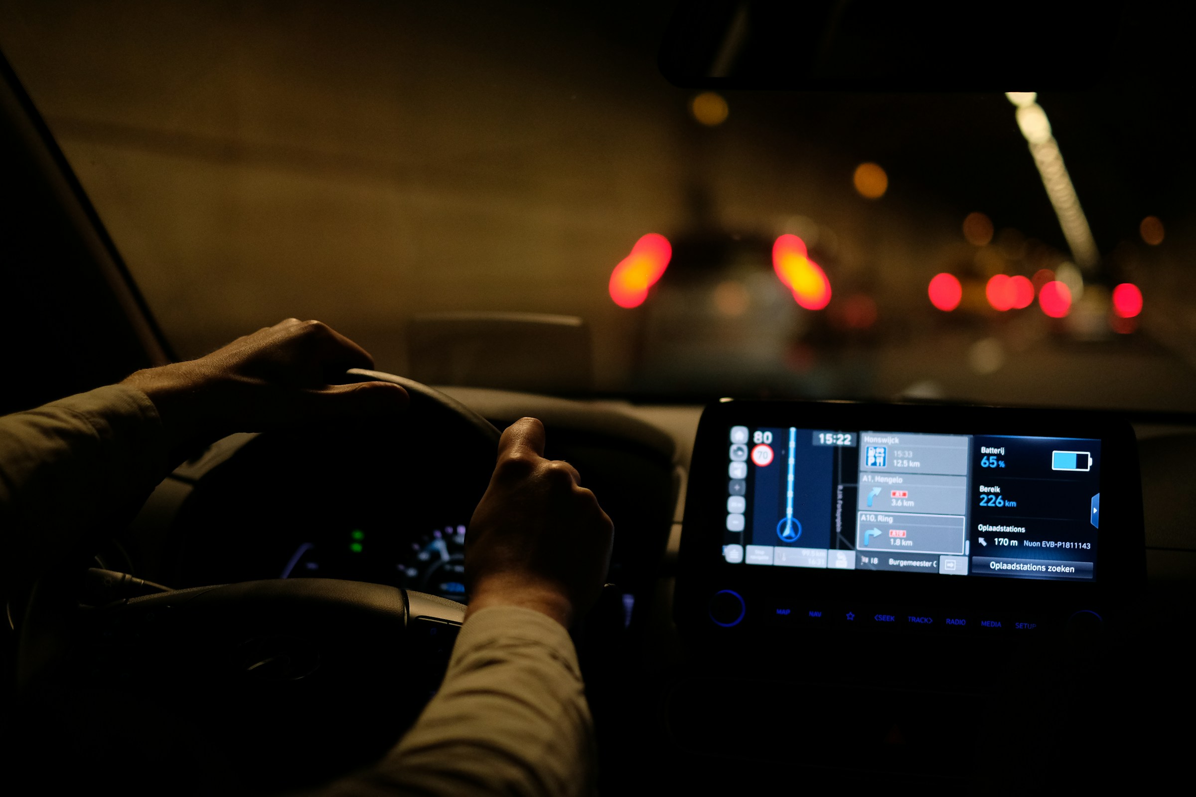 A man driving a car at night | Source: Unsplash