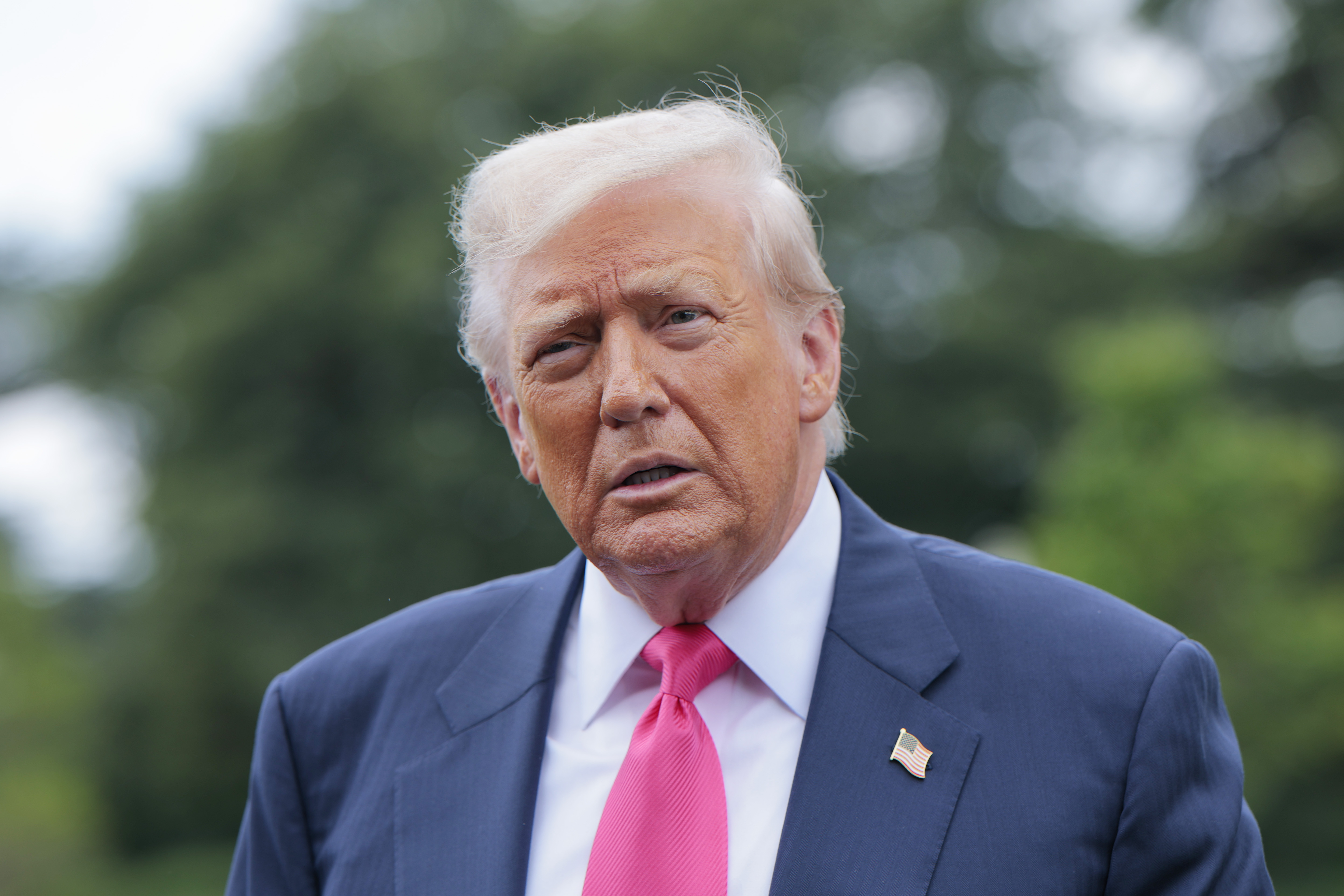 Donald Trump speaking to the media as he departed the White House on July 15, 2025, in Washington, D.C. | Source: Getty Images