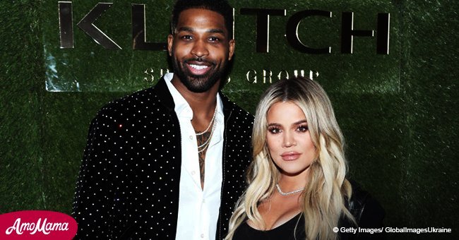 Khloe Kardashian shares a touching snap of Tristan Thompson cradling her naked baby bump