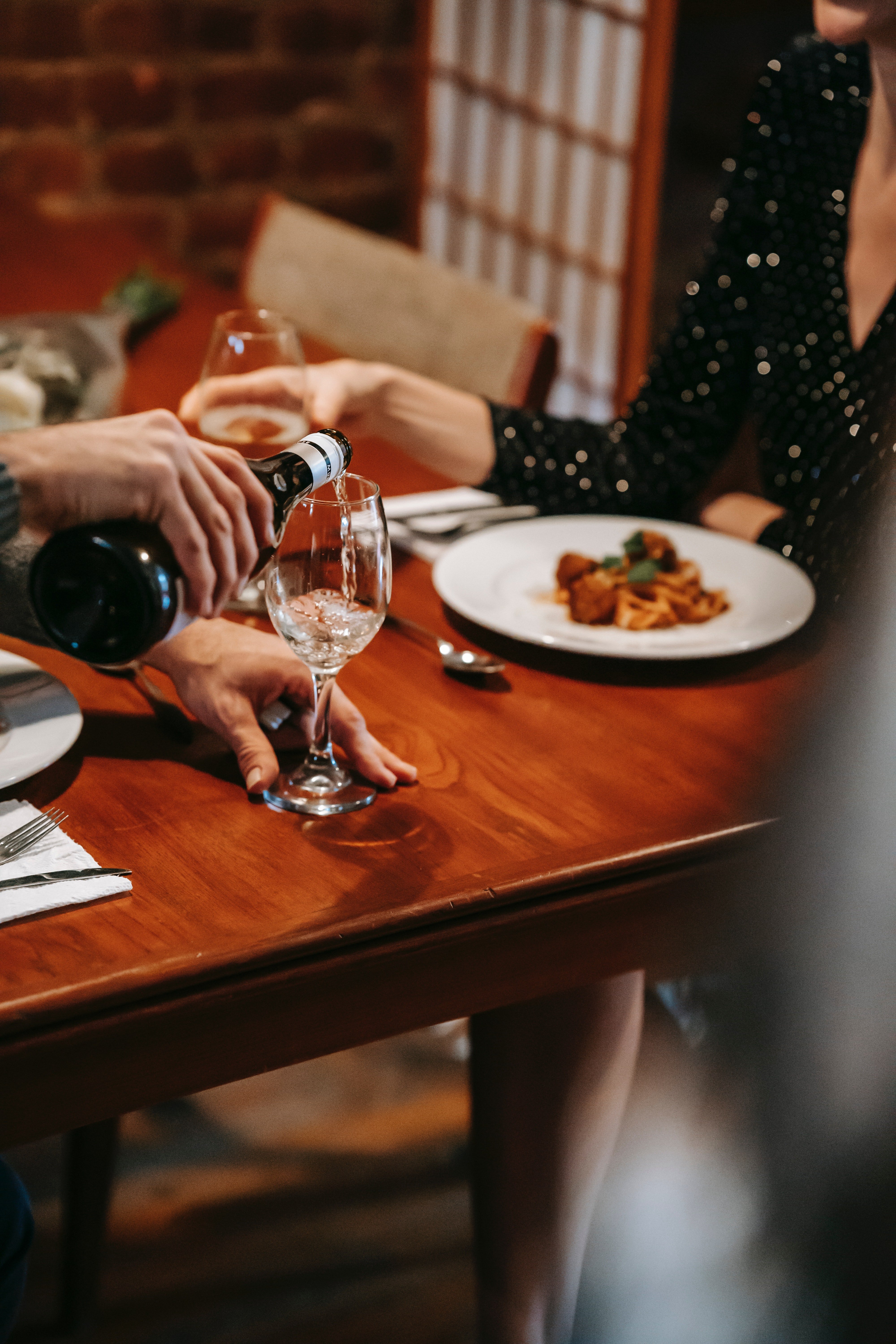 I was having dinner with Jonathan when he popped the question | Source: Pexels