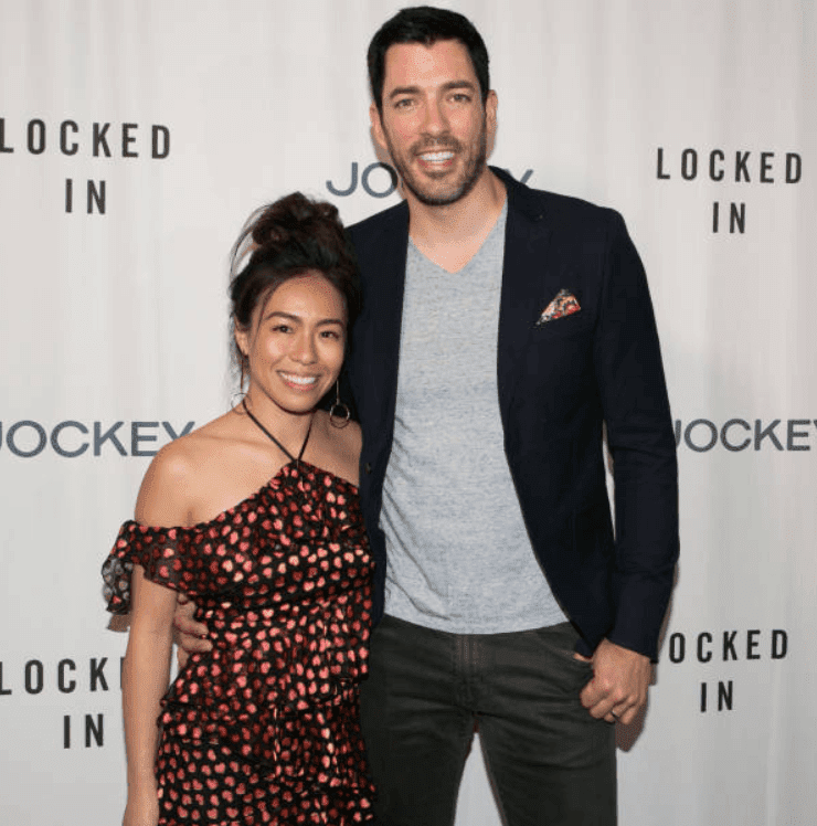 Drew Scott and his wife Linda Phan arrive at the "Locked In" book launch at Cinematic Pictures Group Gallery, on August 23, 2018, in Hollywood, California | Source: Gabriel Olsen/Getty Images