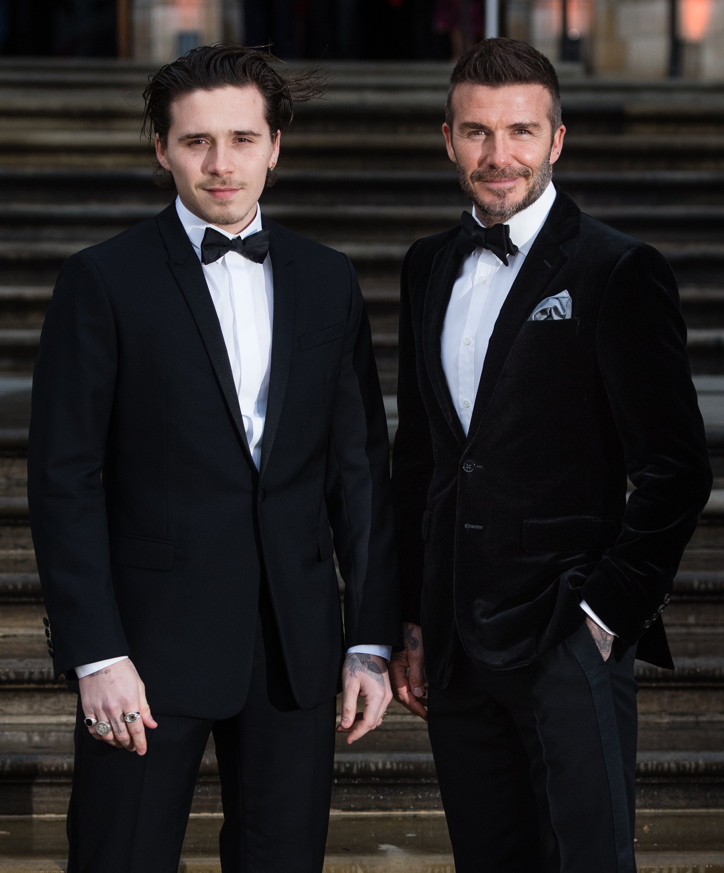 Brooklyn Beckham and David Beckham attend the "Our Planet" global premiere at Natural History Museum on April 04, 2019 in London, England. | Source: Getty Images