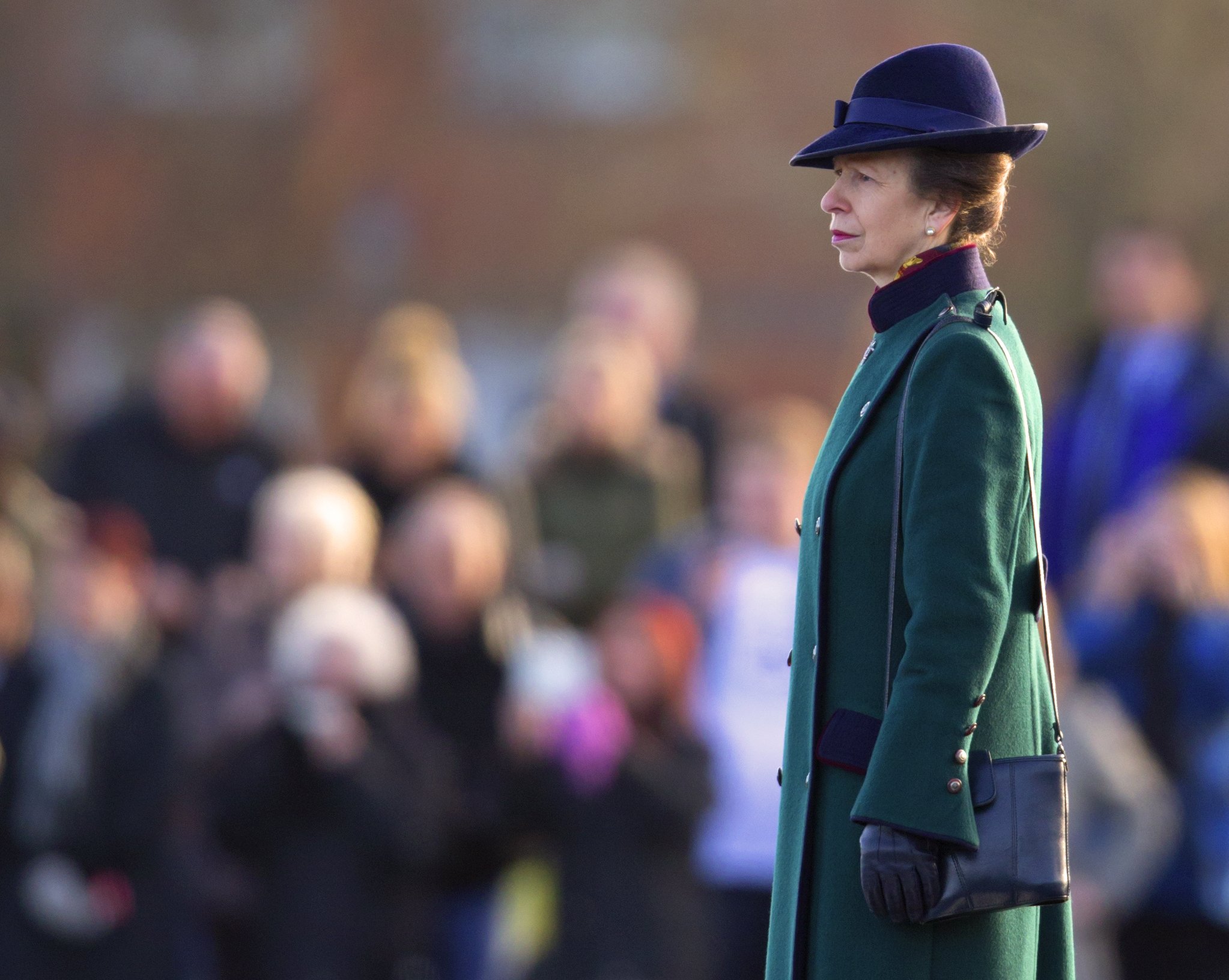 Princess Anne, The Princess Royal (in her role as Colonel-in-Chief of the King's Royal Hussars) takes the salute after presenting the Afghanistan Operational Service Medals to soldiers of the King's Royal Hussars at Aliwal Barracks on December 04, 2012 in Tidworth, England |  Source: Getty Images 