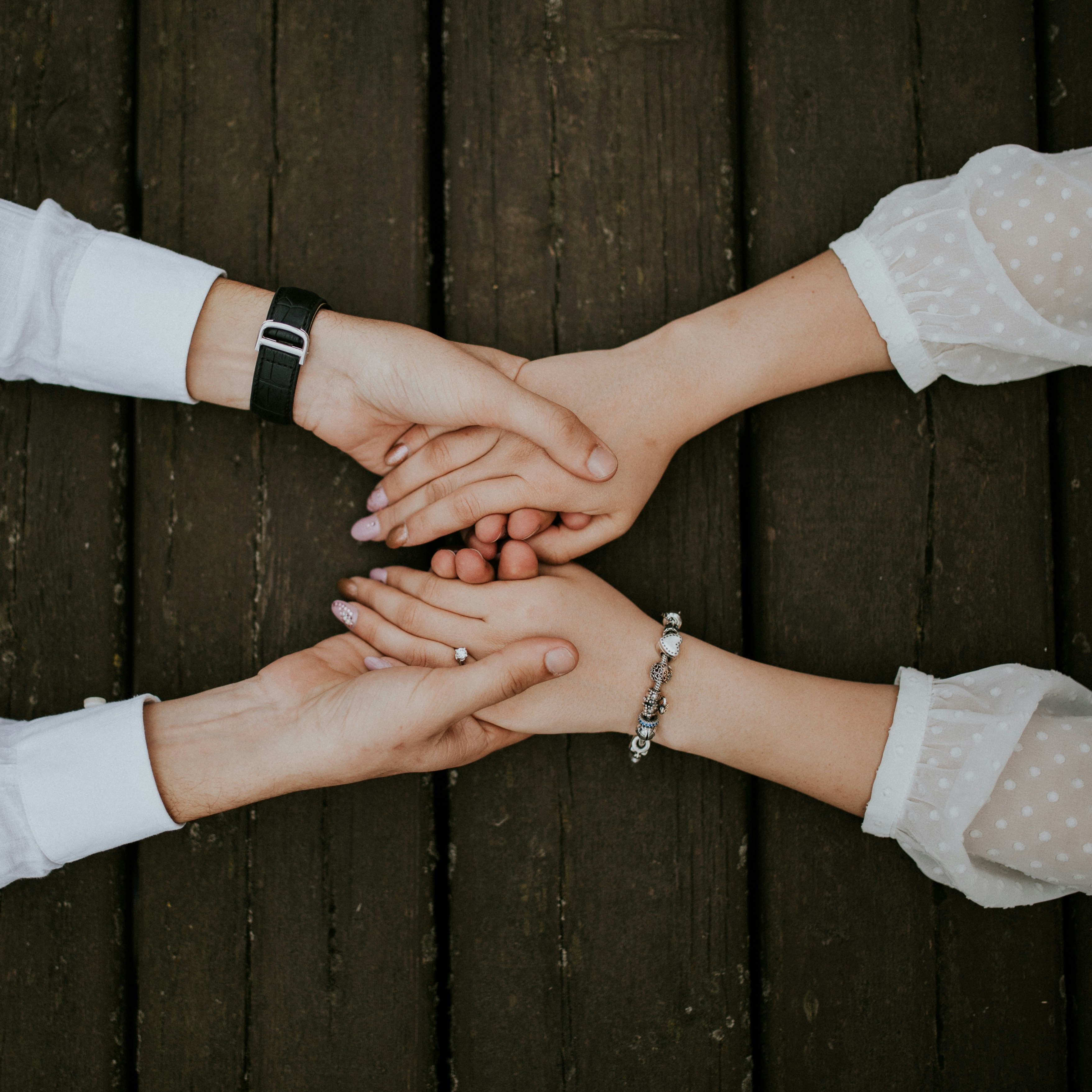 A couple holding hands | Source: Unsplash