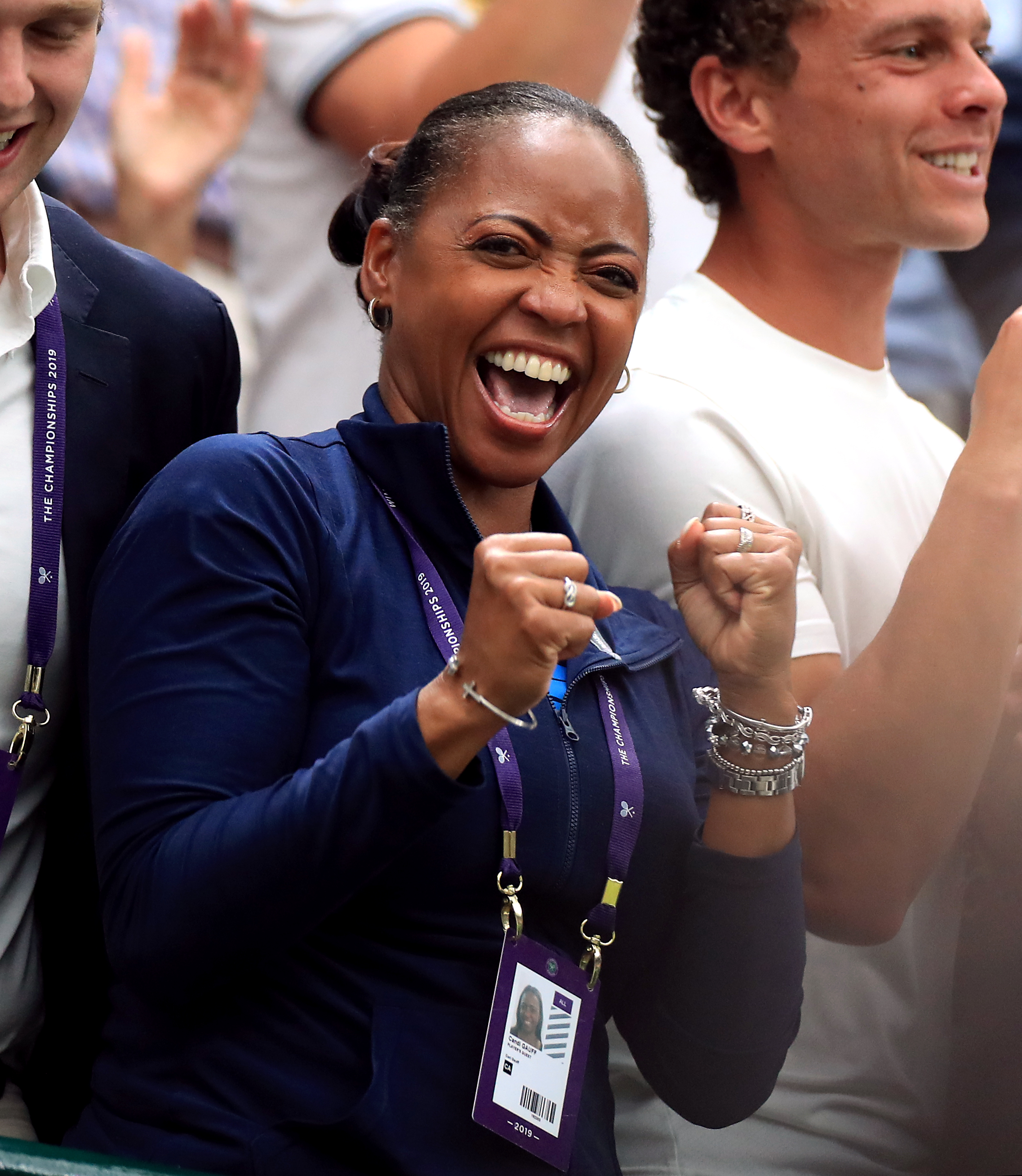 Candi Gauff celebrates after watching her daughter Cori Gauff beat Magdalena Rybarikova on day three of the Wimbledon Championships at the All England Lawn Tennis and Croquet Club on July 3, 2019, in Wimbledon. | Source: Getty Images